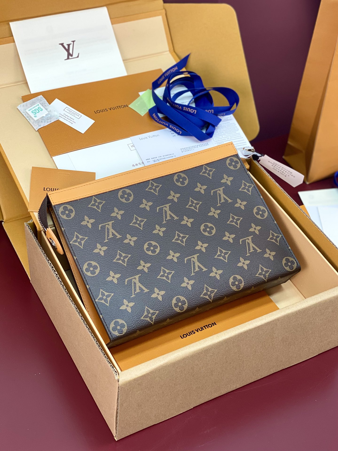 M12820 Pochette Voyage MM in Safran Yellow Monogram Macassar coated canvas