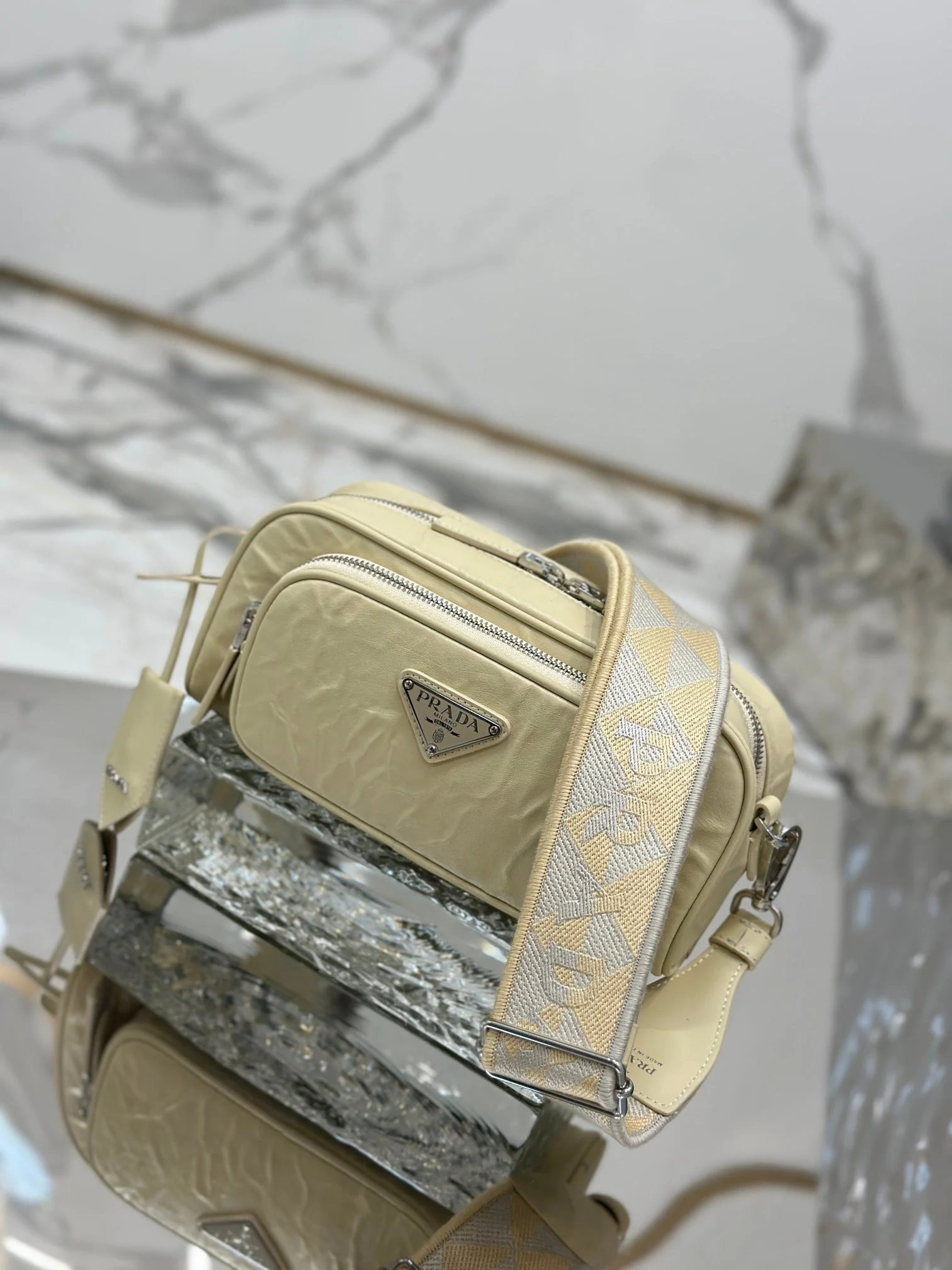 Prada CAMERA BAG 23 IN CREAM WRINKLED LAMBSKIN
