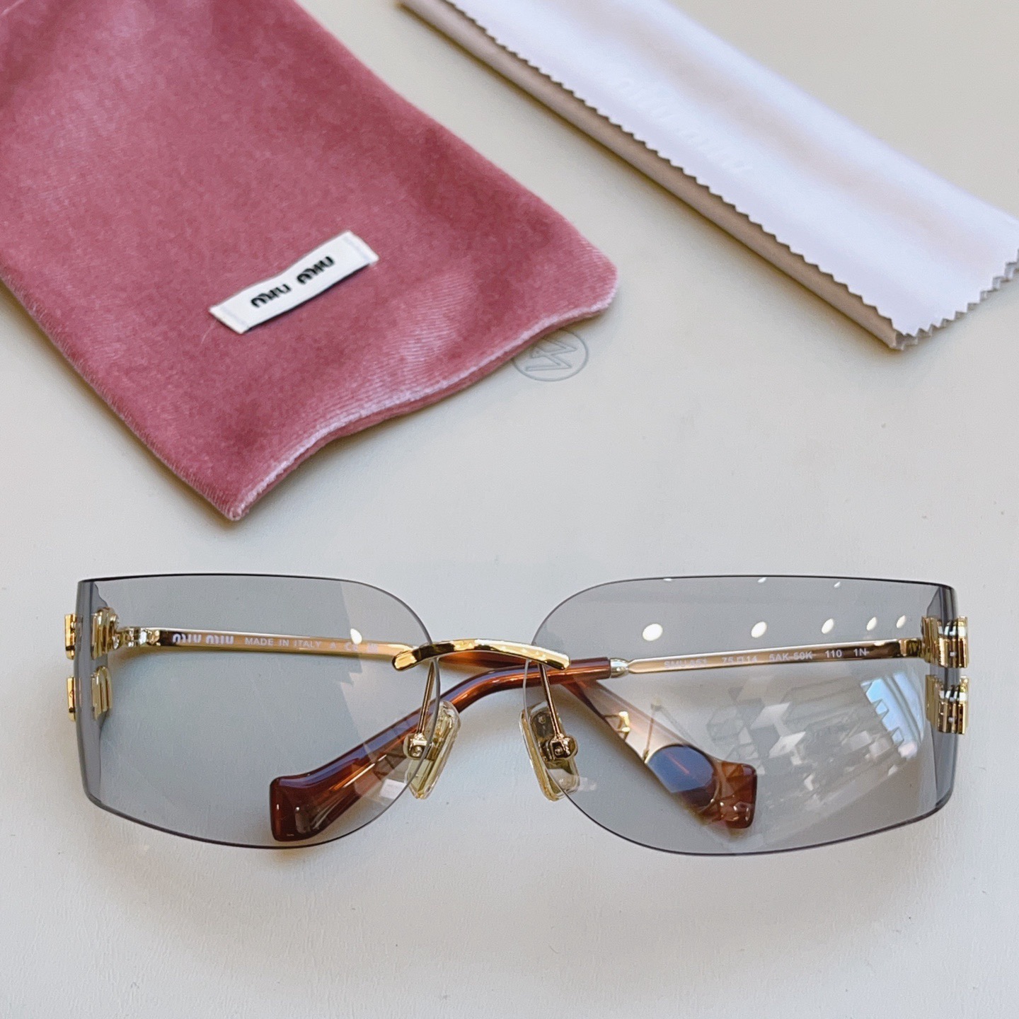 Miu Miu Iconic Metal-Hinge Avant-Garde Rimless Sunglasses - KAIROO