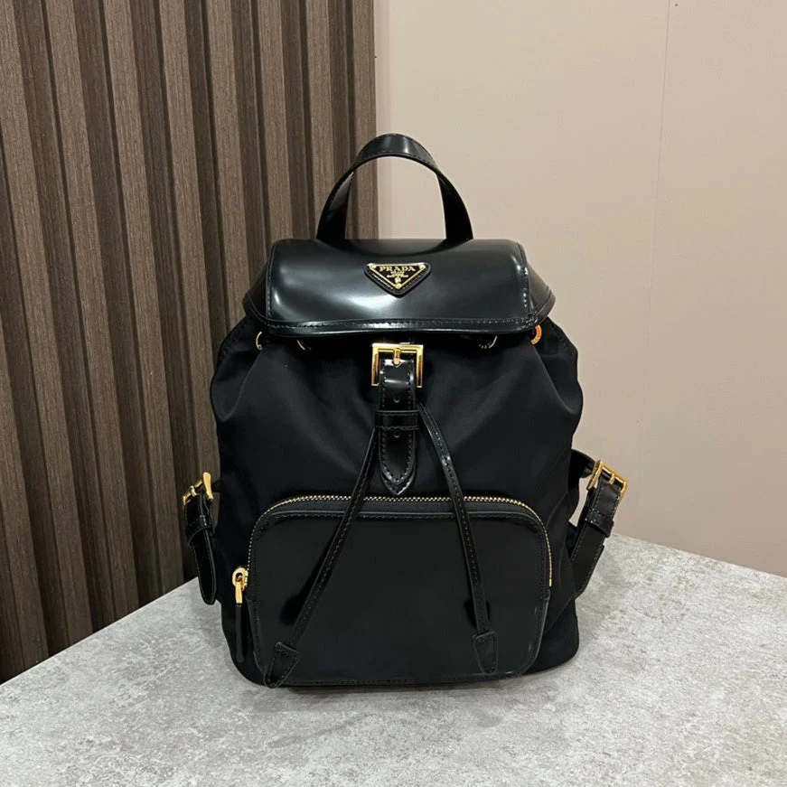 Prada BACKPACK 25 IN BLACK RE-NYLON AND GLOSSY CALFSKIN GOLD HARDWARE