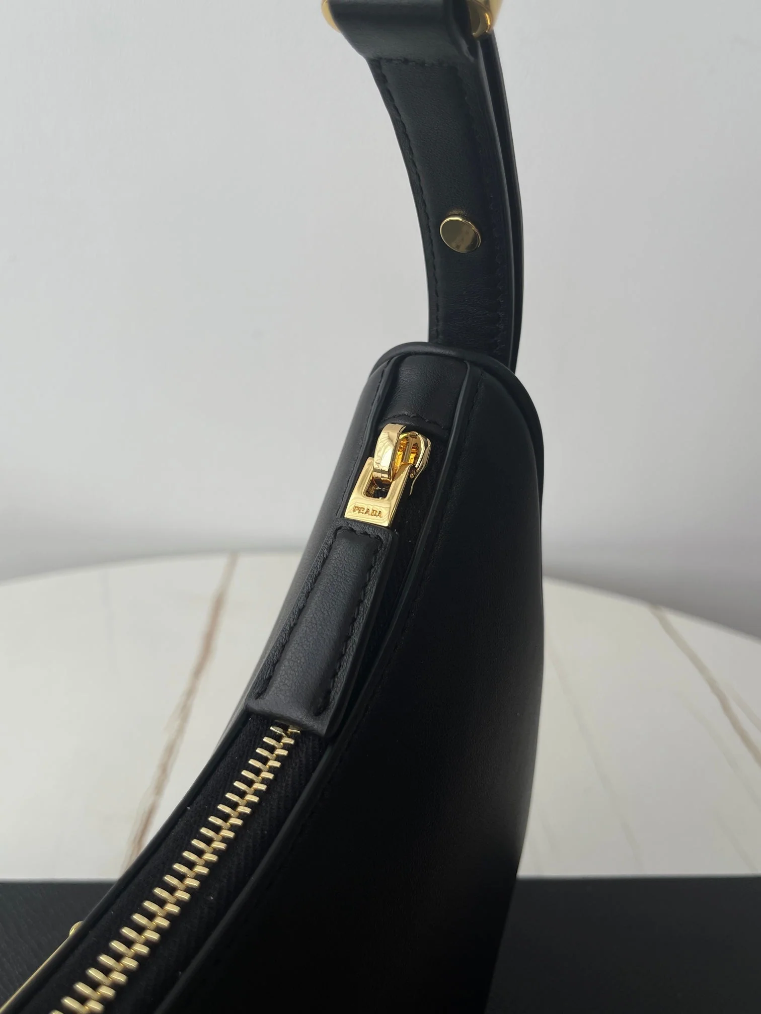 Prada ARQUÉ 22 SHOULDER BAG IN BLACK LEATHER