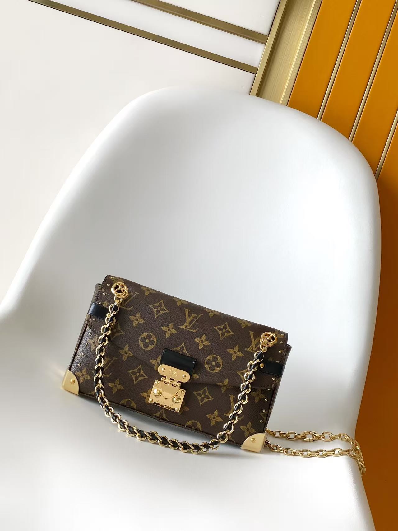 Louis Vuitton East West horizontal version Trunkie handbag