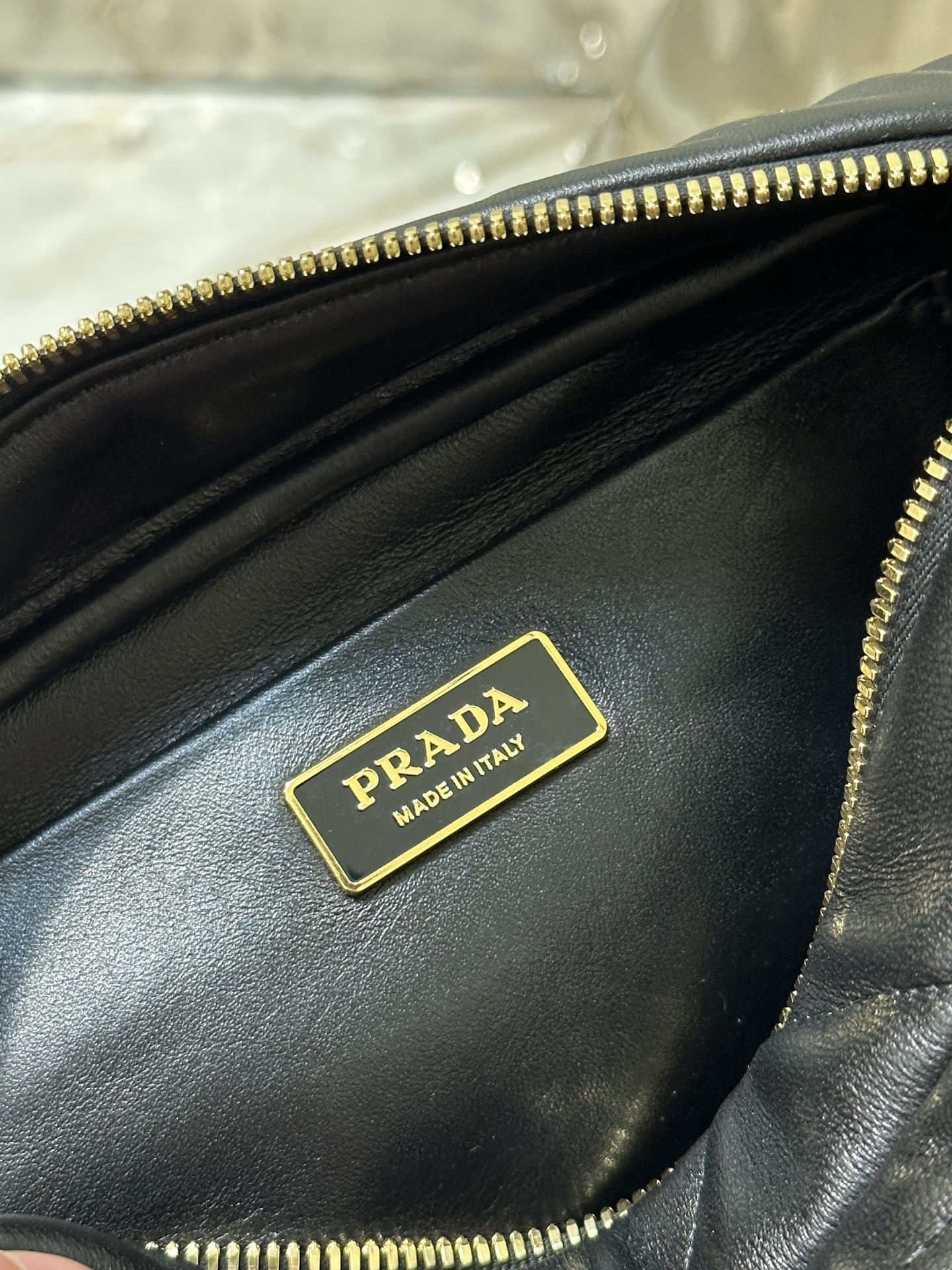 Prada CAMERA BAG 22 IN BLACK TRIANGLE PATTERN QUILTED LAMBSKIN GOLD HARDWARE