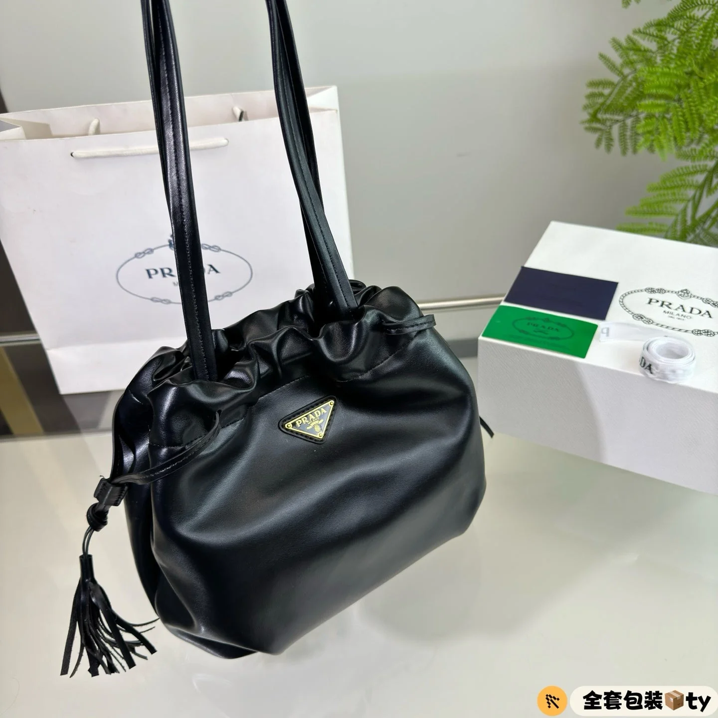 Prada DRAWSTRING BUCKET BAG 25 IN BLACK SOFT LAMBSKIN