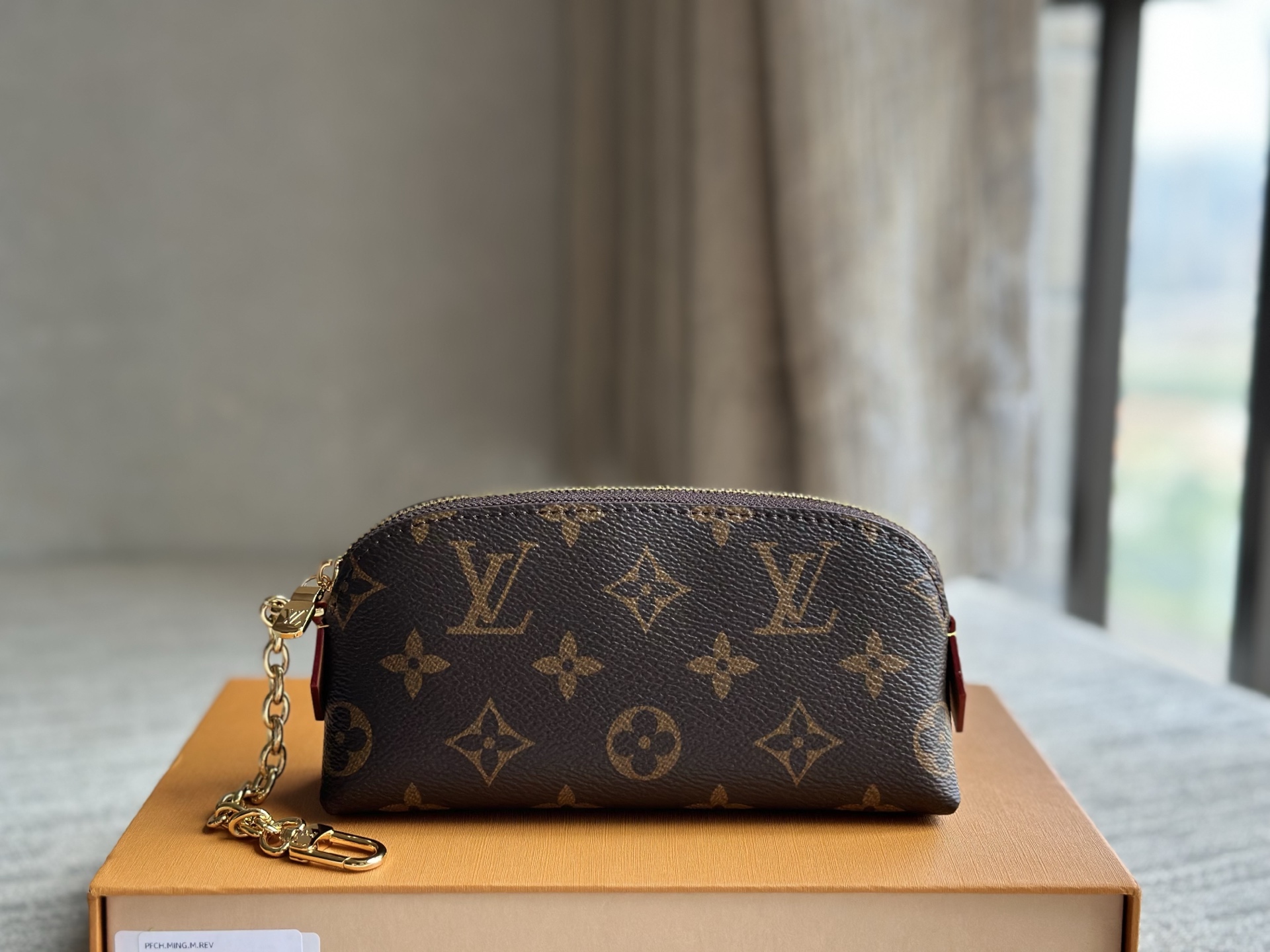 M25694 Cosmetic Lipstick Pouch in Monogram Canvas