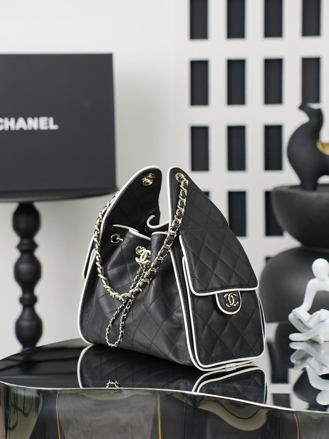 Chanel 25 Small Hobo Bag in Black calfskin and white trim AS5293