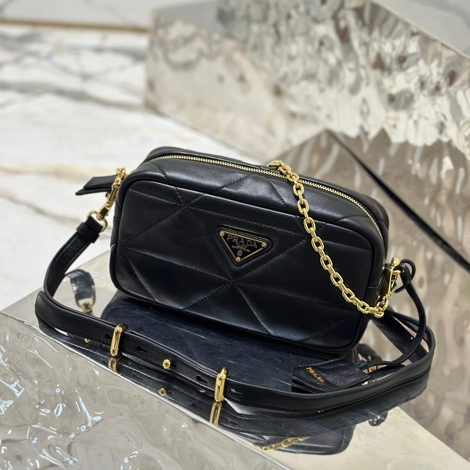 Prada CAMERA BAG 22 IN BLACK TRIANGLE PATTERN QUILTED LAMBSKIN GOLD HARDWARE