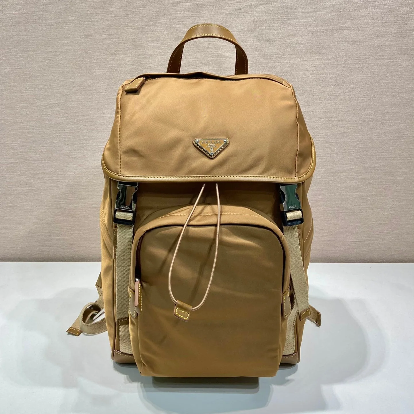 Prada BACKPACK 45 IN CIDER BROWN RE-NYLON AND CALFSKIN TRIM