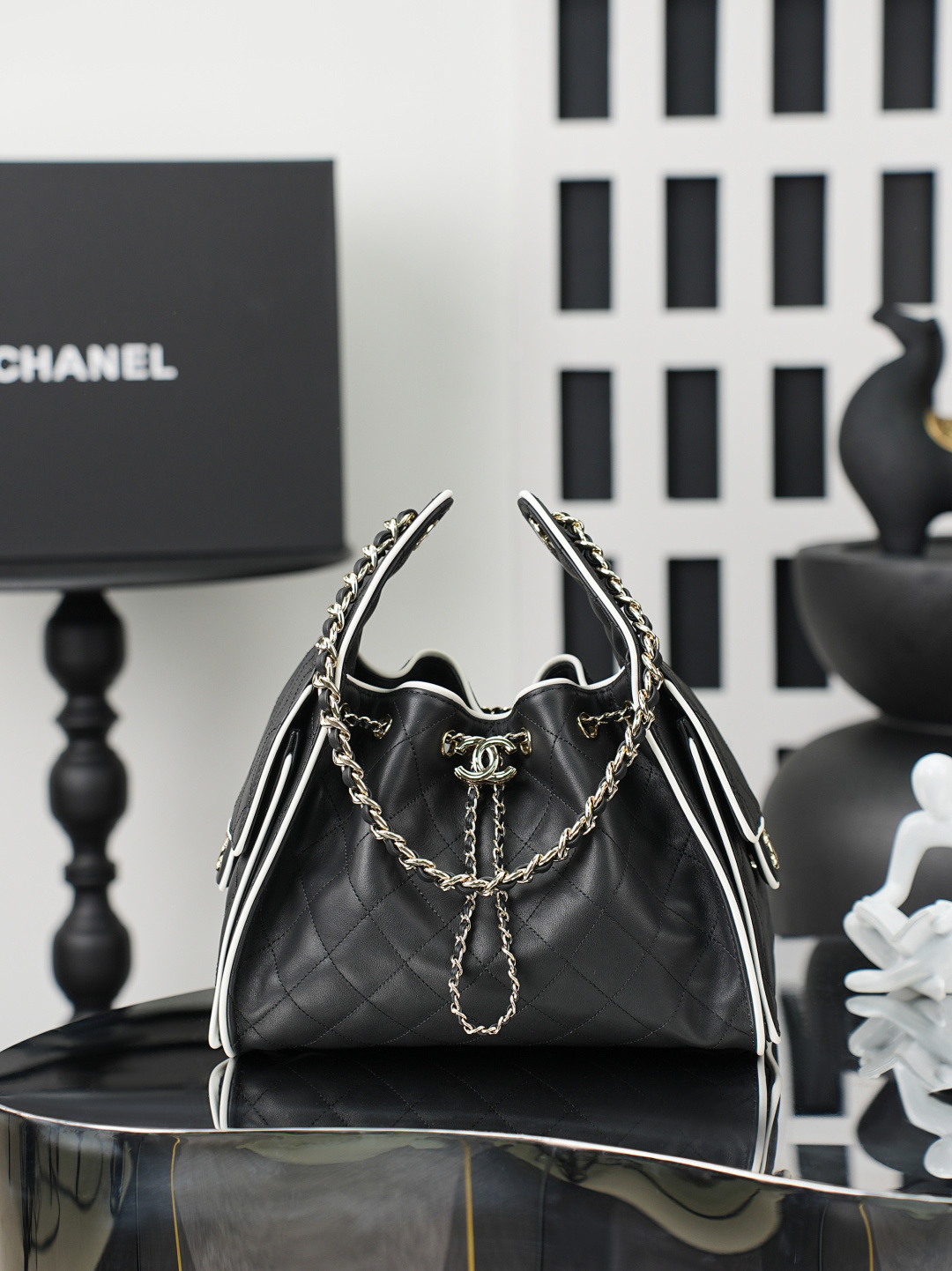 Chanel 25 Small Hobo Bag in Black calfskin and white trim AS5293
