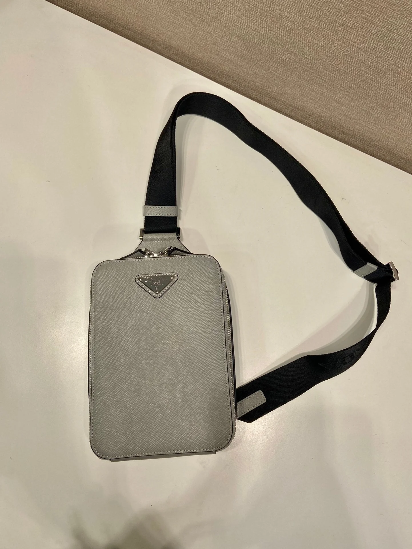 Prada CHEST BAG 20 IN ECHO GRAY SAFFIANO LEATHER
