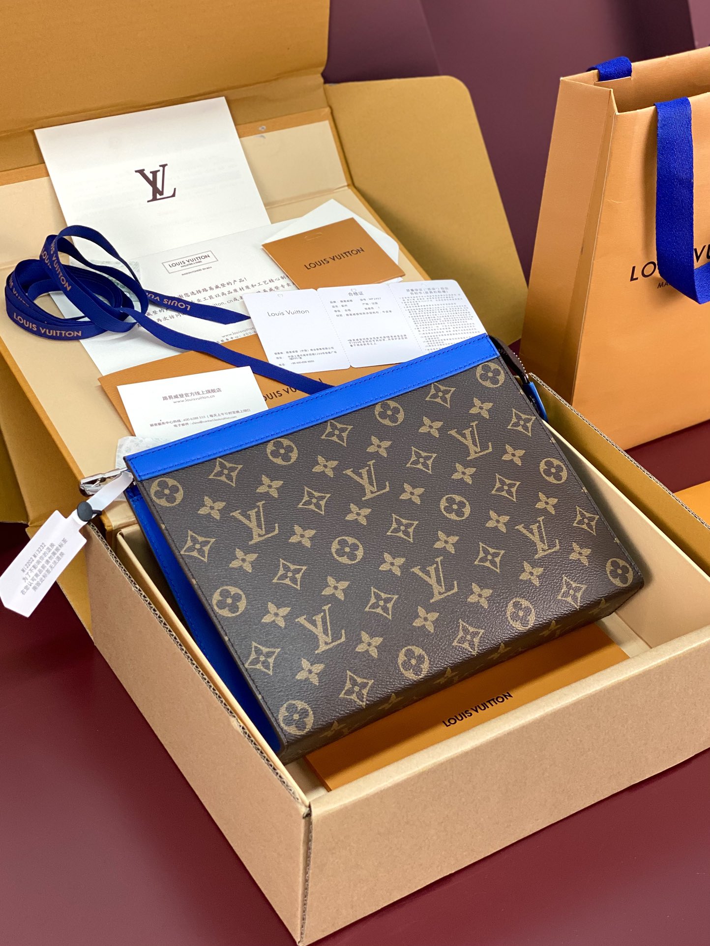 M12819 Pochette Voyage MM in Gaston Pondichery Indigo Blue Monogram Macassar  canvas