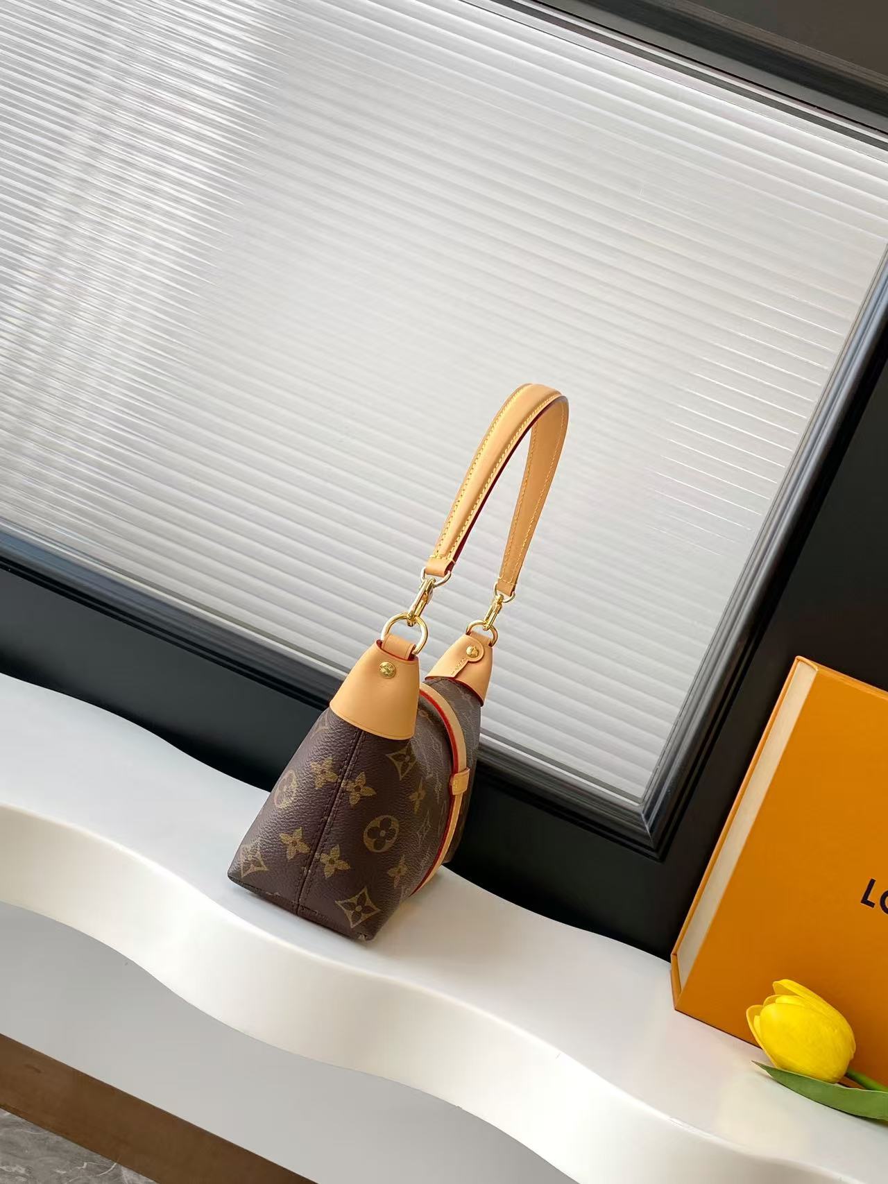 Louis Vuitton Pochette Mia Handbag