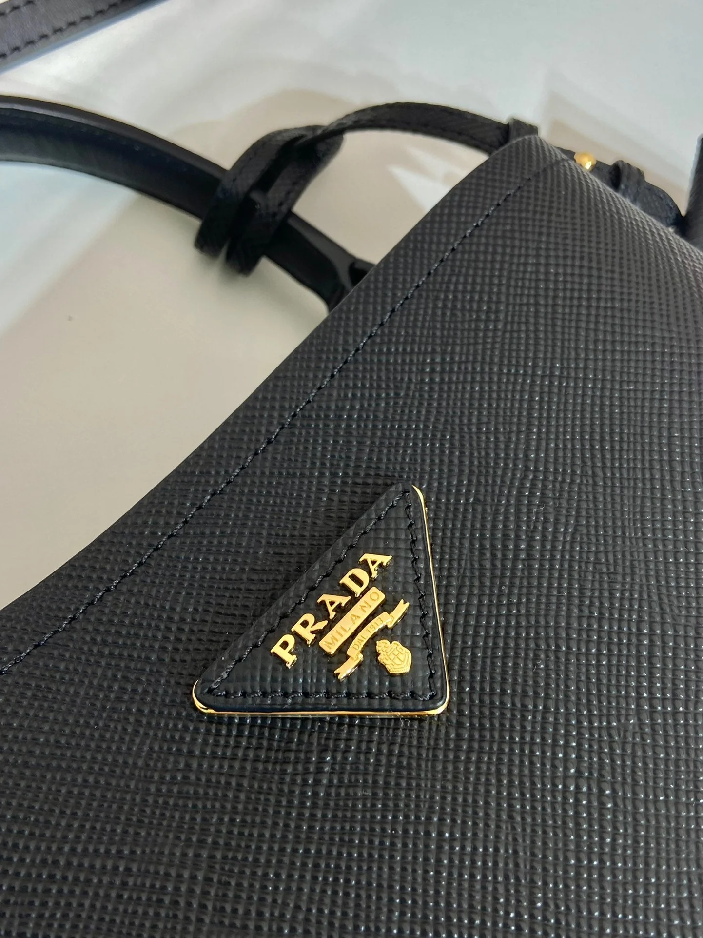Prada BUCKET BAG 23 IN BLACK SAFFIANO LEATHER
