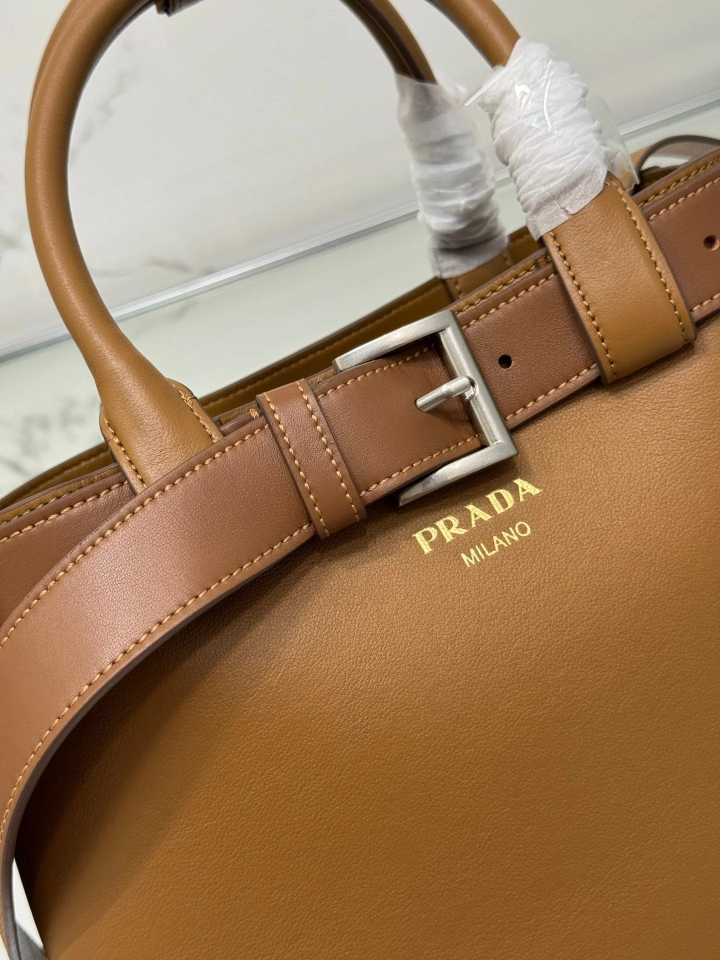 Prada TOTE BAG 32 IN CIDER BROWN IMPORTED CALFSKIN