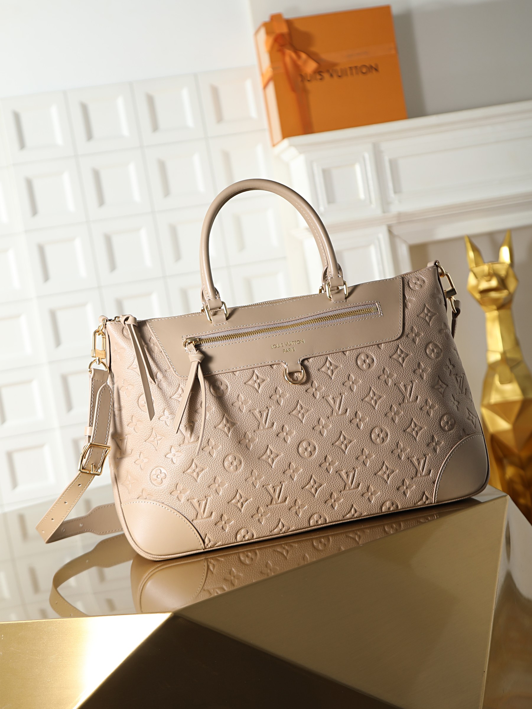 Louis Vuitton Skyline MM handbag in apricot color
