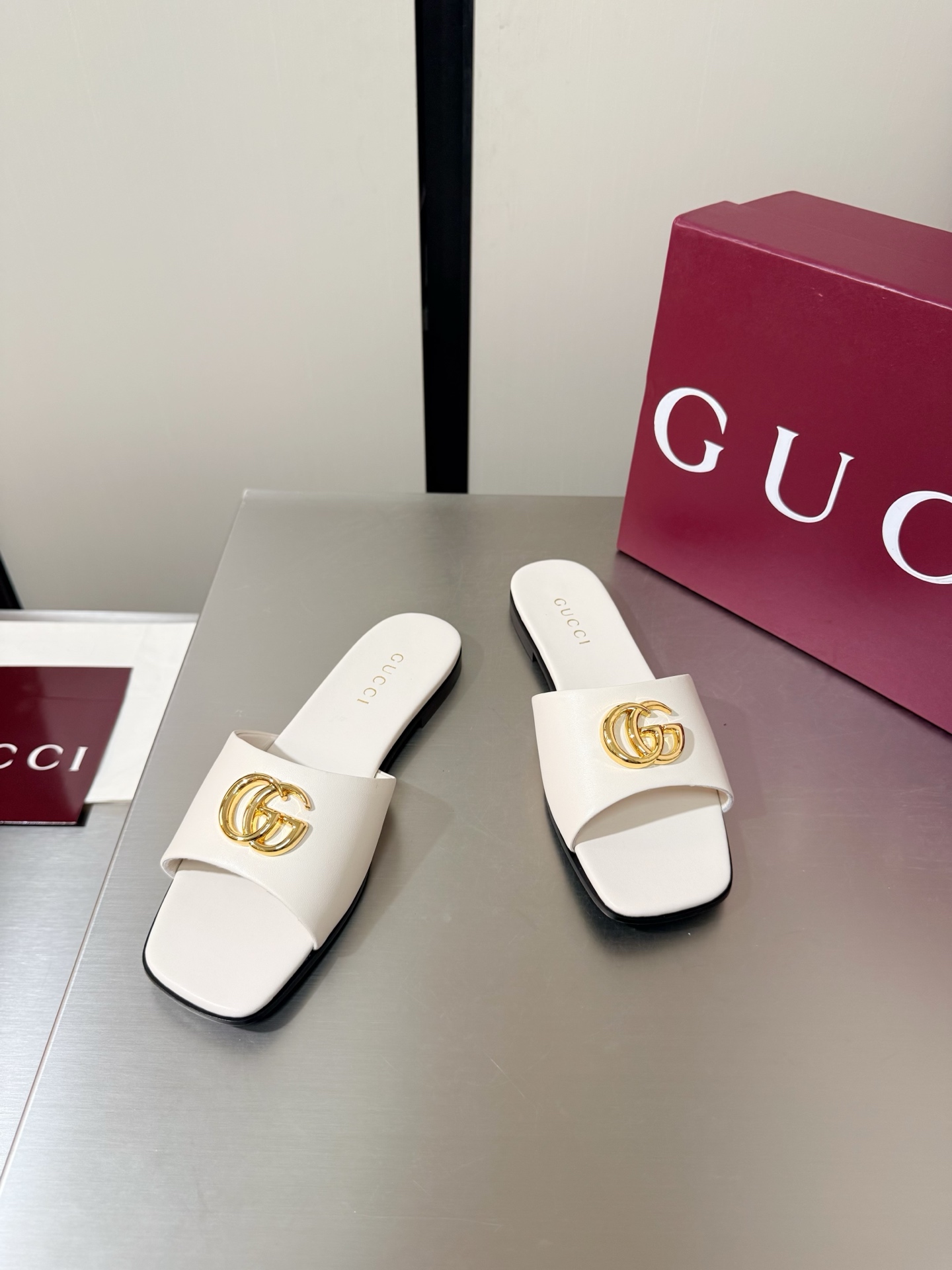 Women's Gucci Flat slide sandal with Double G
