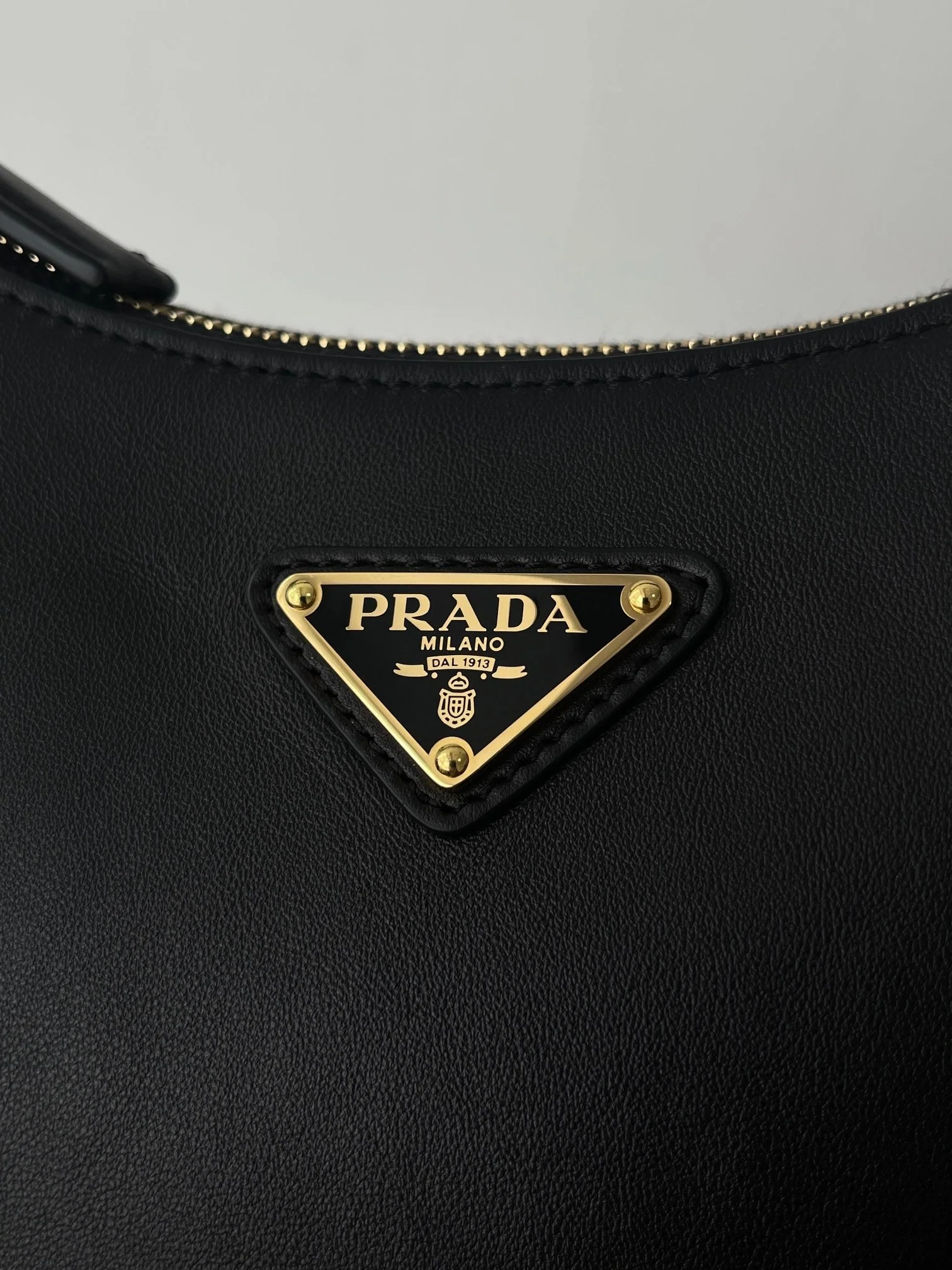 Prada ARQUÉ 22 SHOULDER BAG IN BLACK LEATHER
