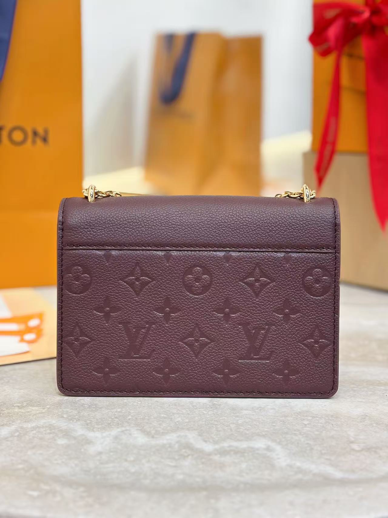 Louis Vuitton Burgundy chain bag