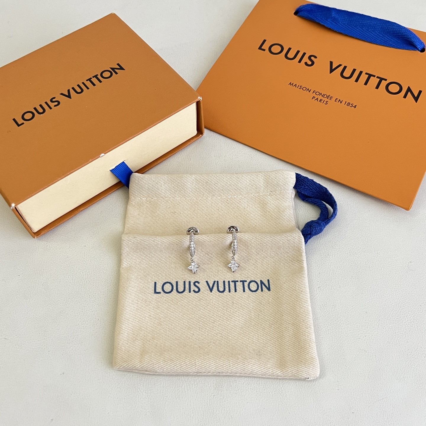 Louis Vuitton LV Paved Crystal Hoop Earrings With Four-point Star Charm (Gold & Silver Two-tone) - KAIROO
