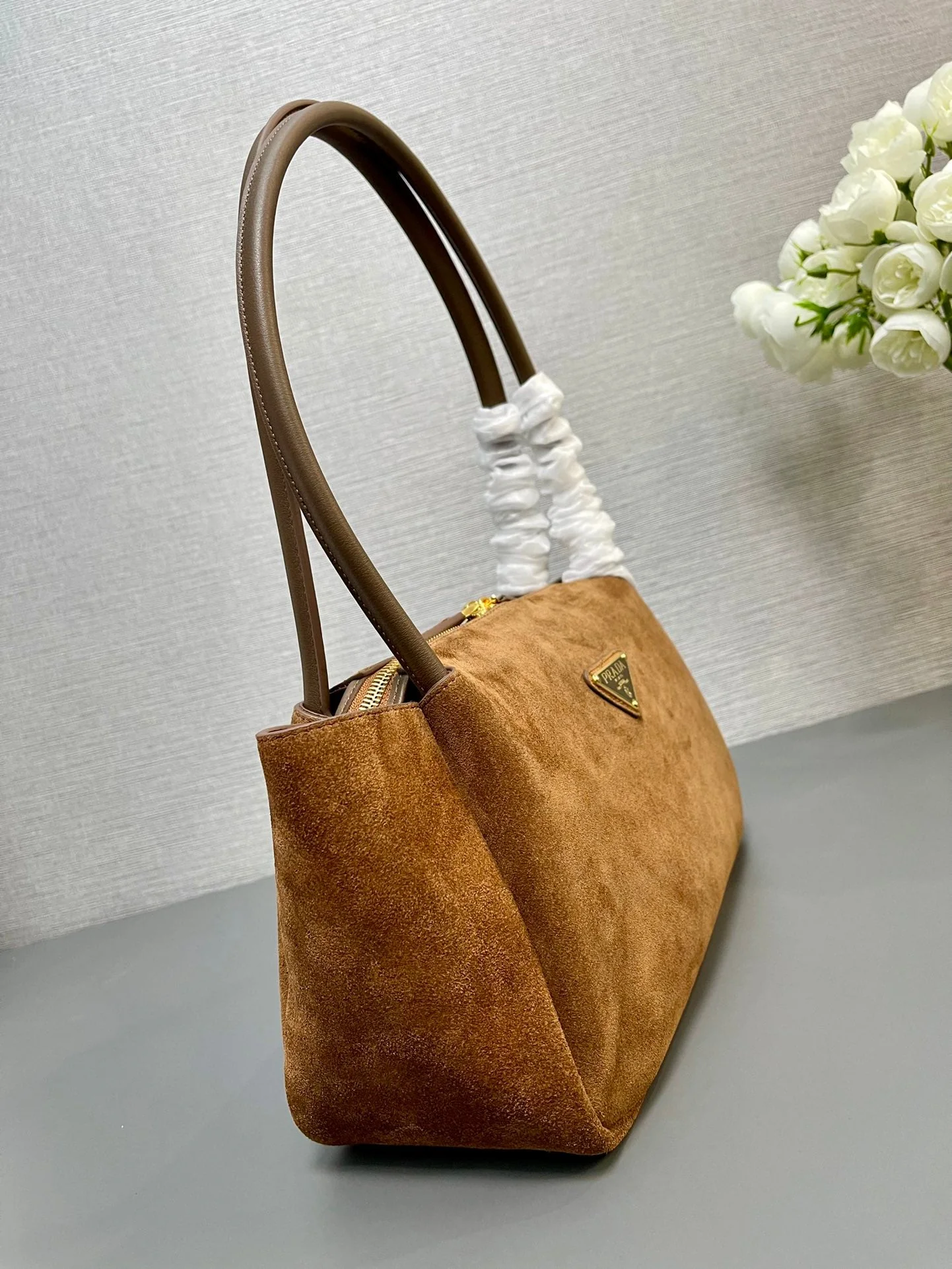 Prada SHOULDER BAG 28 IN TAWNY BROWN SUEDE GOLD LOGO