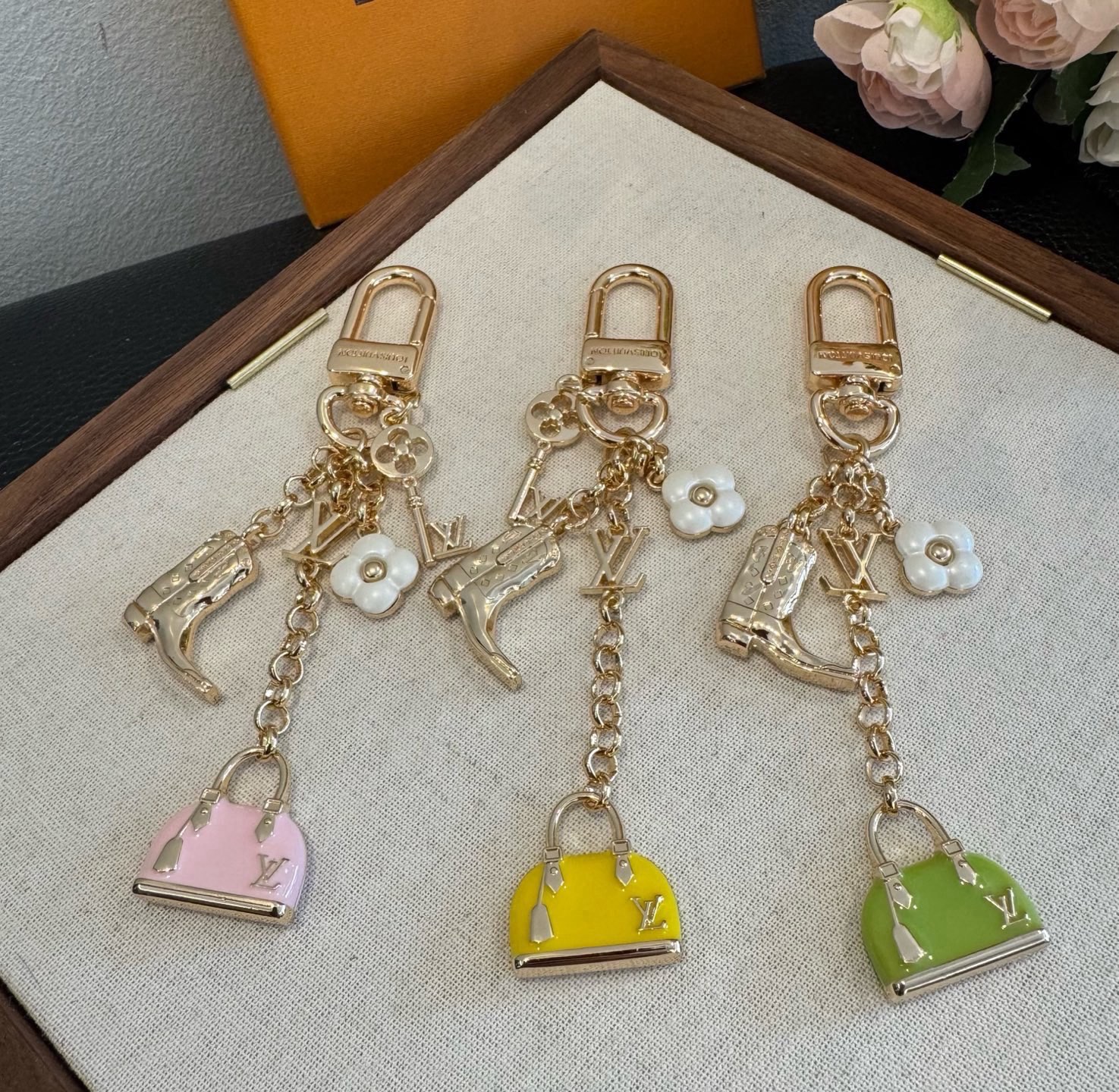 Louis Vuitton LV  Mini Alma Cowboy Boot Four-Leaf Clover Keychain & Bag Charm - KAIROO