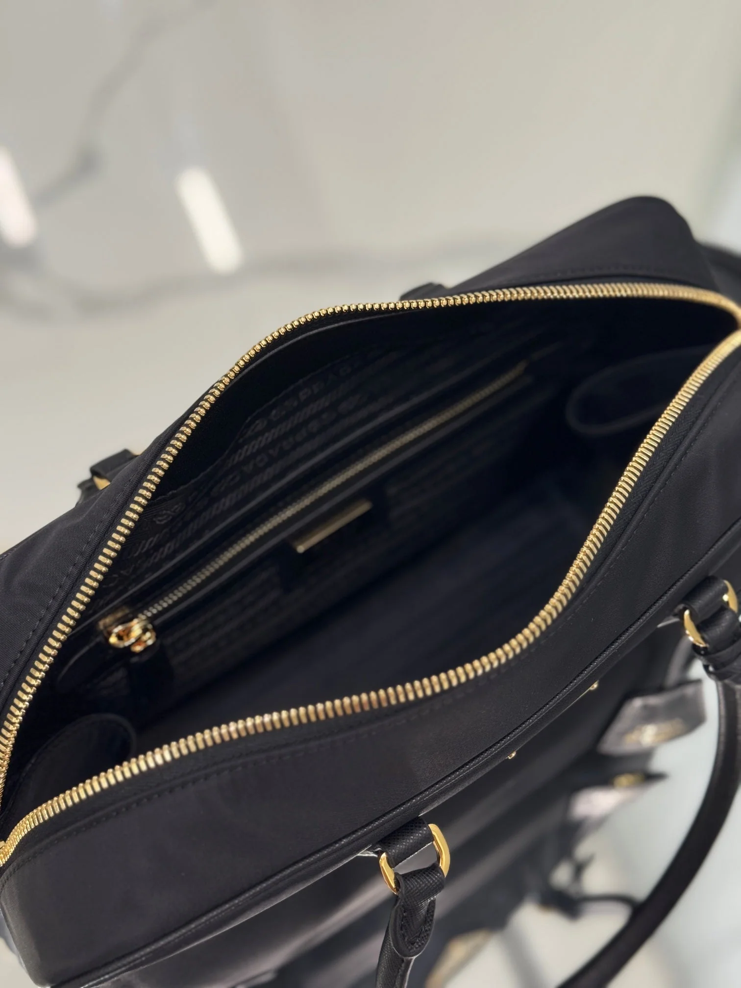 Prada LARGE TOP HANDLE BAG 35 IN BLACK NYLON AND CALFSKIN TRIM