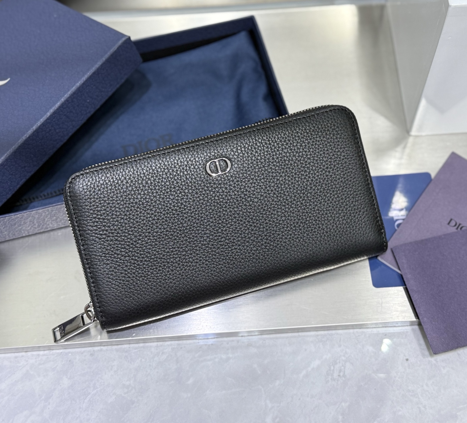 Dior Zip around Wallet in Black Grained leather