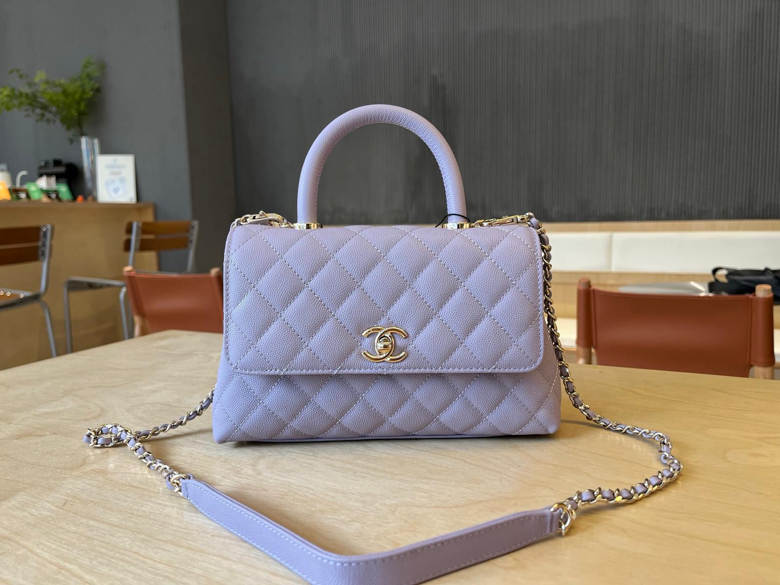 CHANEL hand-held flap bag