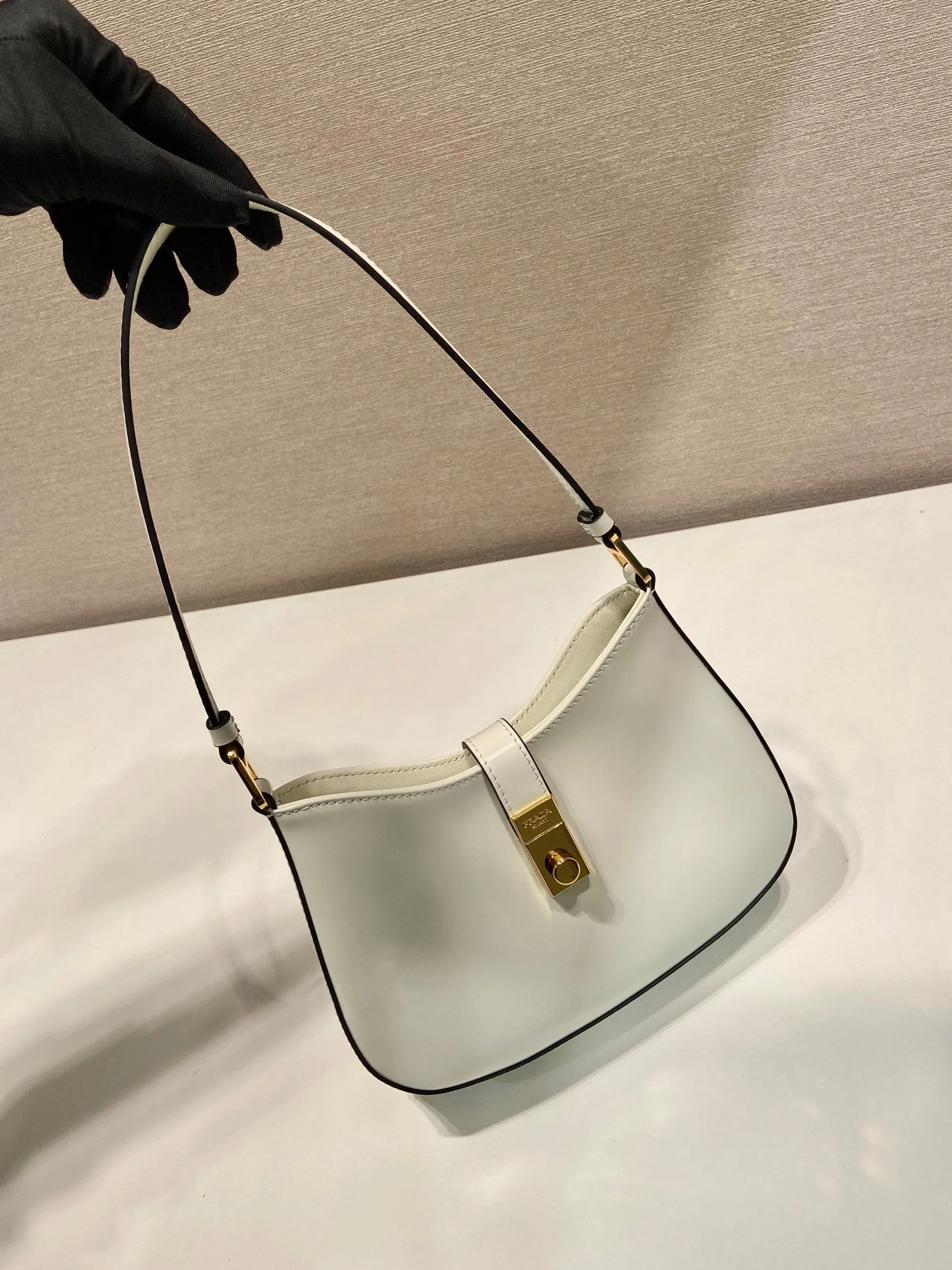 Prada CLEO SHOULDER BAG 22 IN WHITE BRUSHED LAMBSKIN WITH CLASP CLOSURE