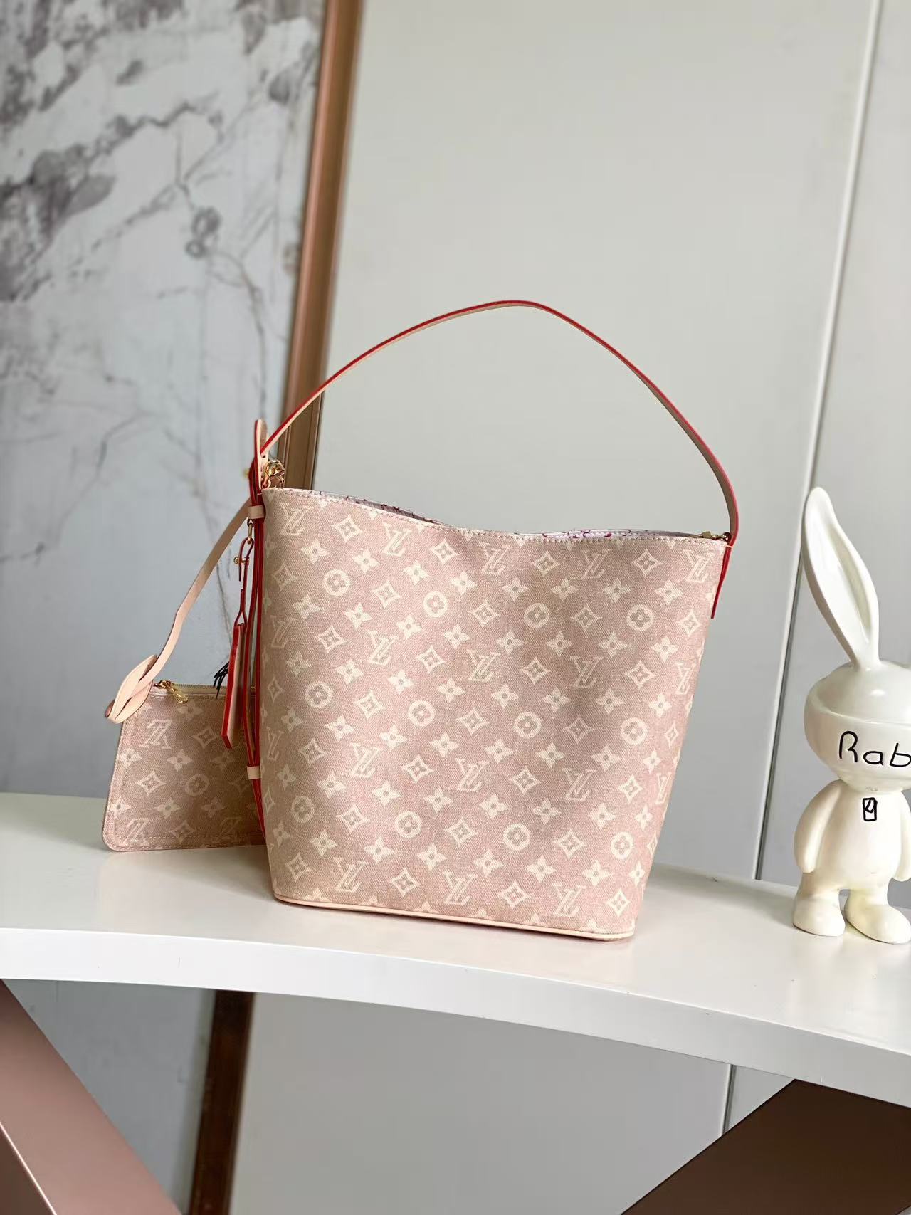 Louis Vuitton Travels With series bucket bags