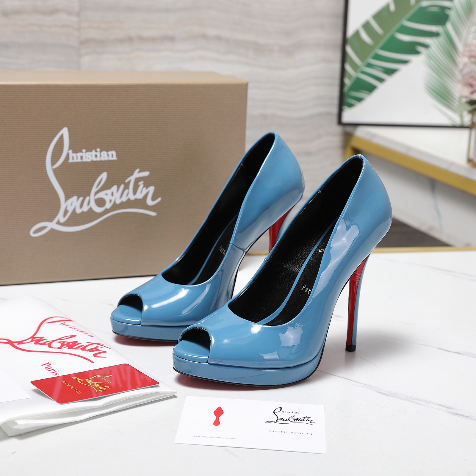 Christian Louboutin Shiny Calfskin Platform Pumps in Blue