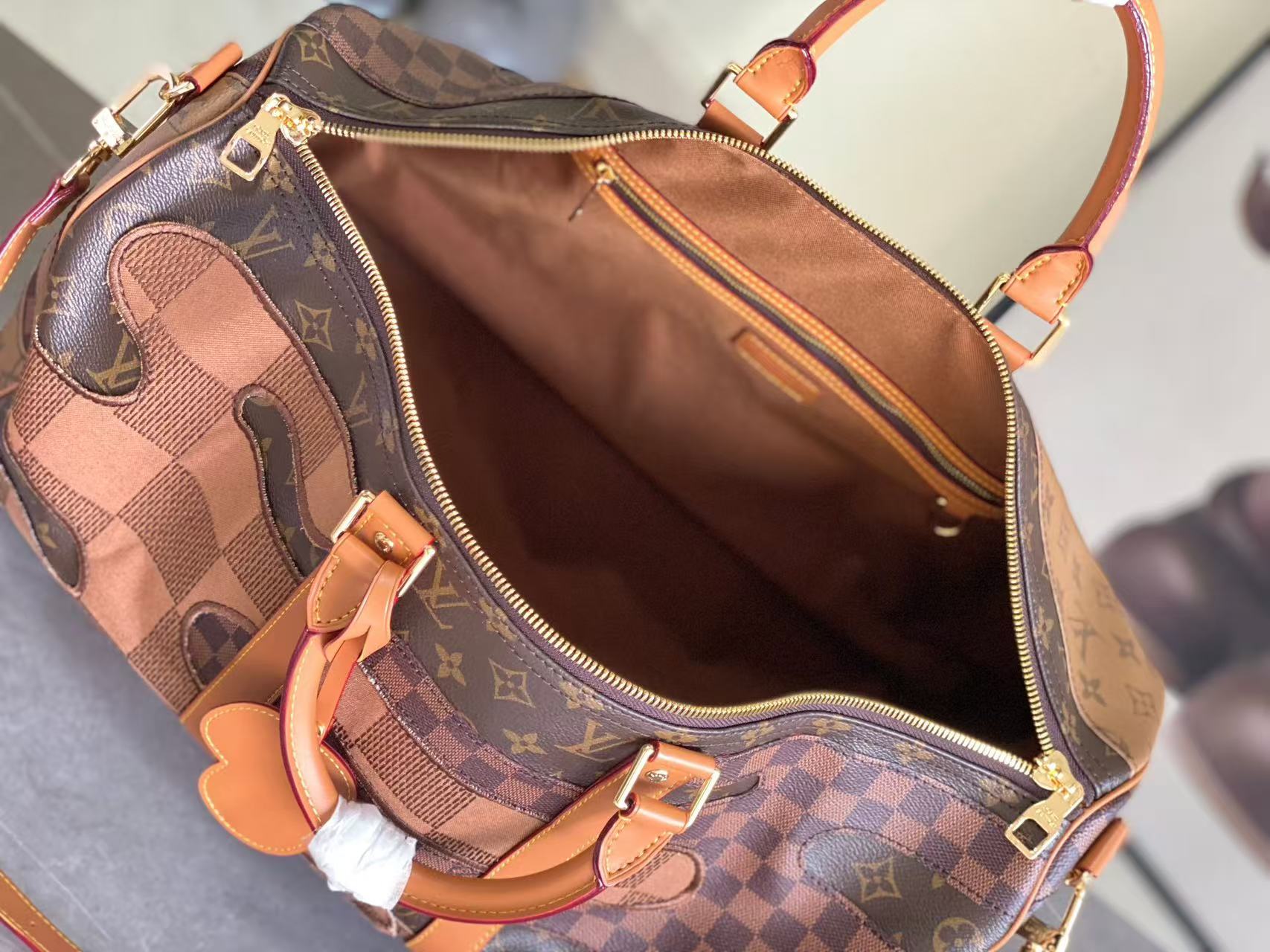 Louis Vuitton LV Keepall Bandouli è re 50 travel bag