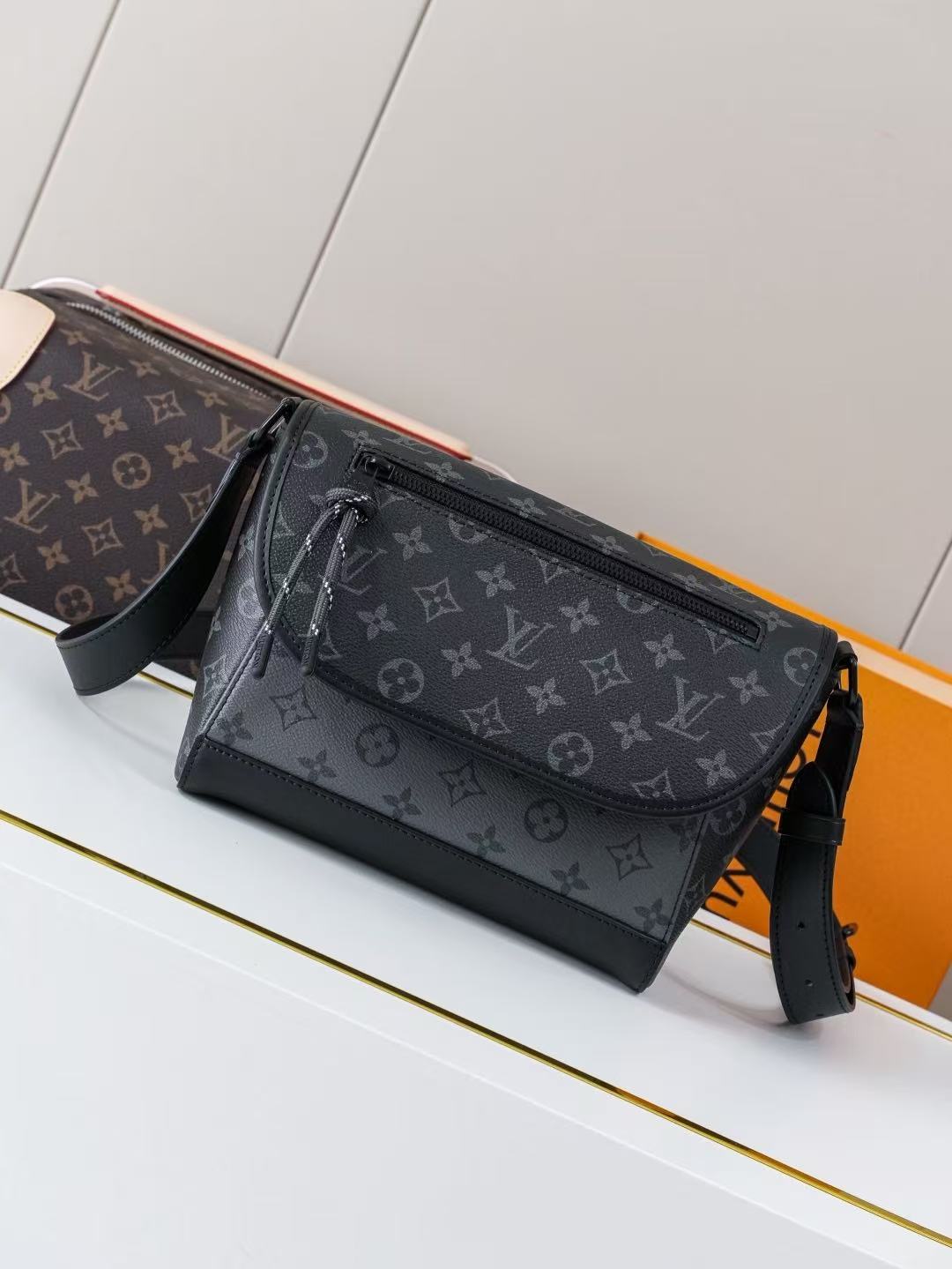 Louis Vuitton Monogram Eclipse Reverse coated canvas crossbody bag