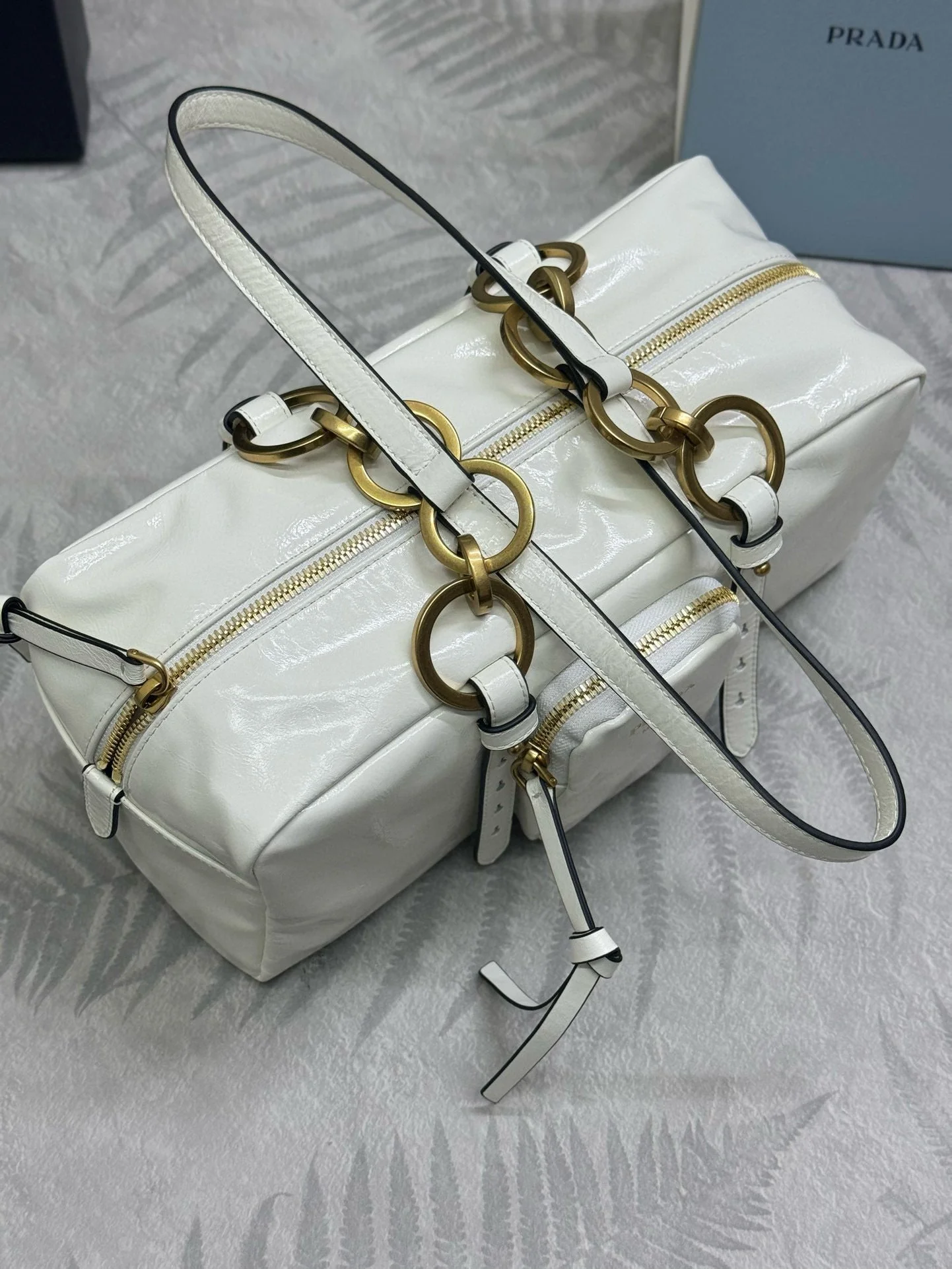 Prada DANGLE TOP HANDLE BAG 30 IN WHITE PATENT CALFSKIN