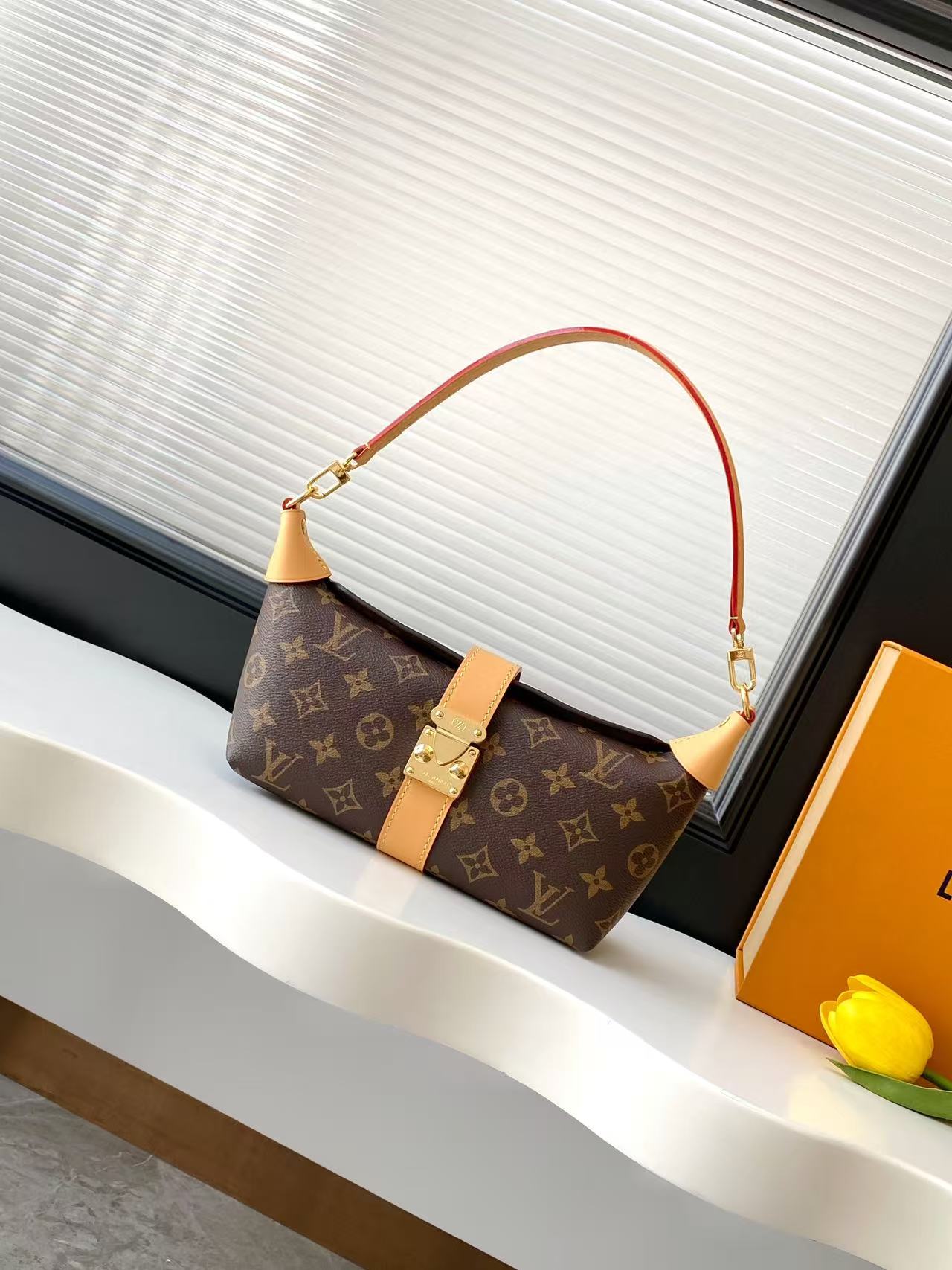 Louis Vuitton Pochette Mia Handbag