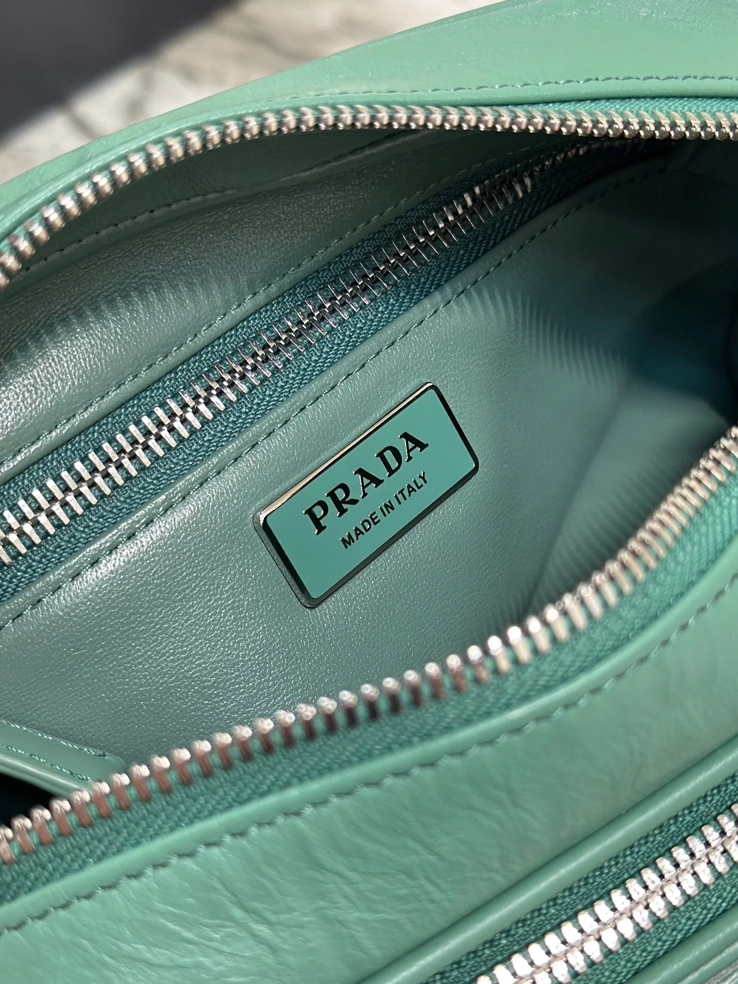 Prada CAMERA BAG 23 IN CASTLETON GREEN WRINKLED LAMBSKIN