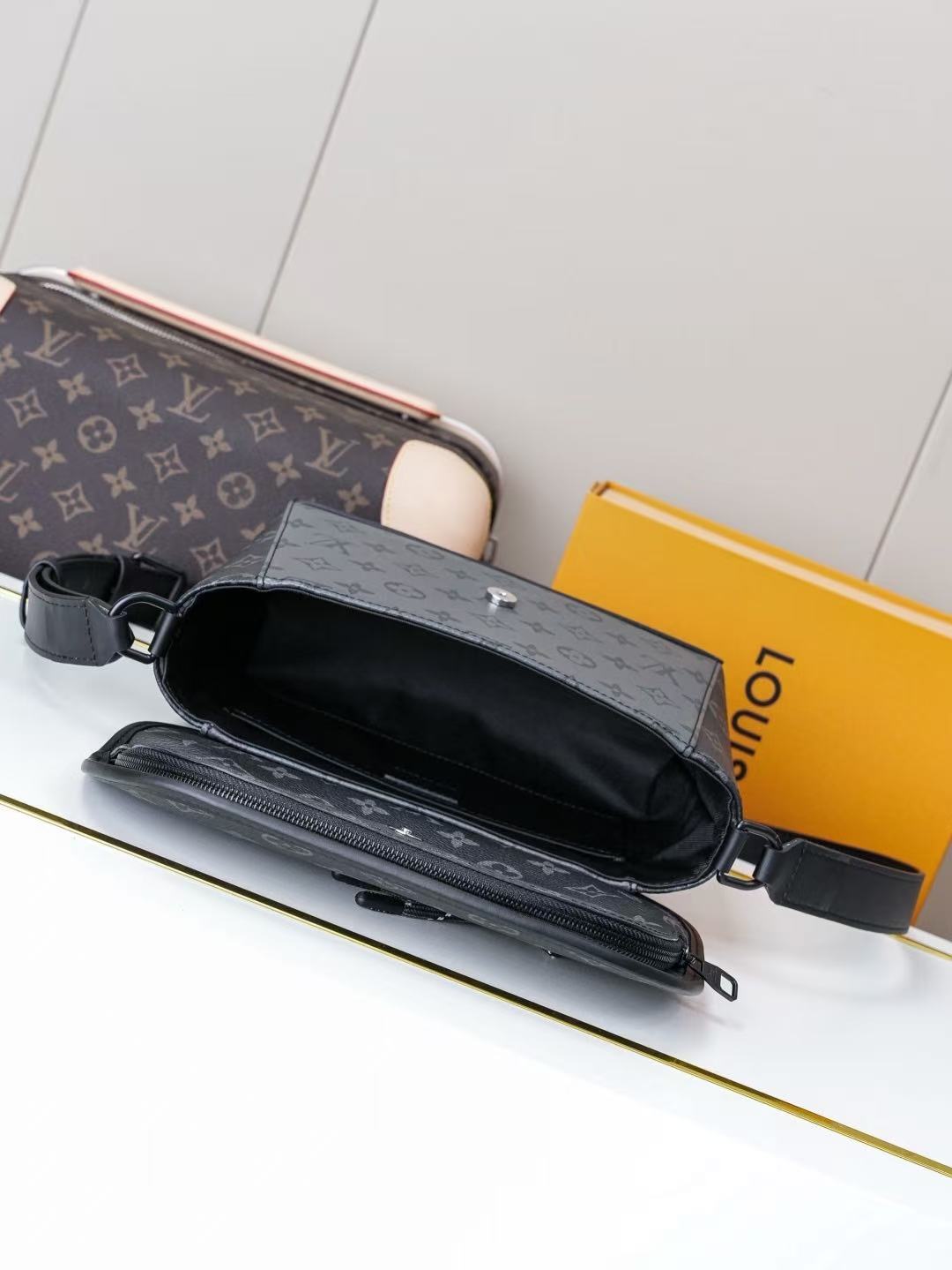 Louis Vuitton Monogram Eclipse Reverse coated canvas crossbody bag