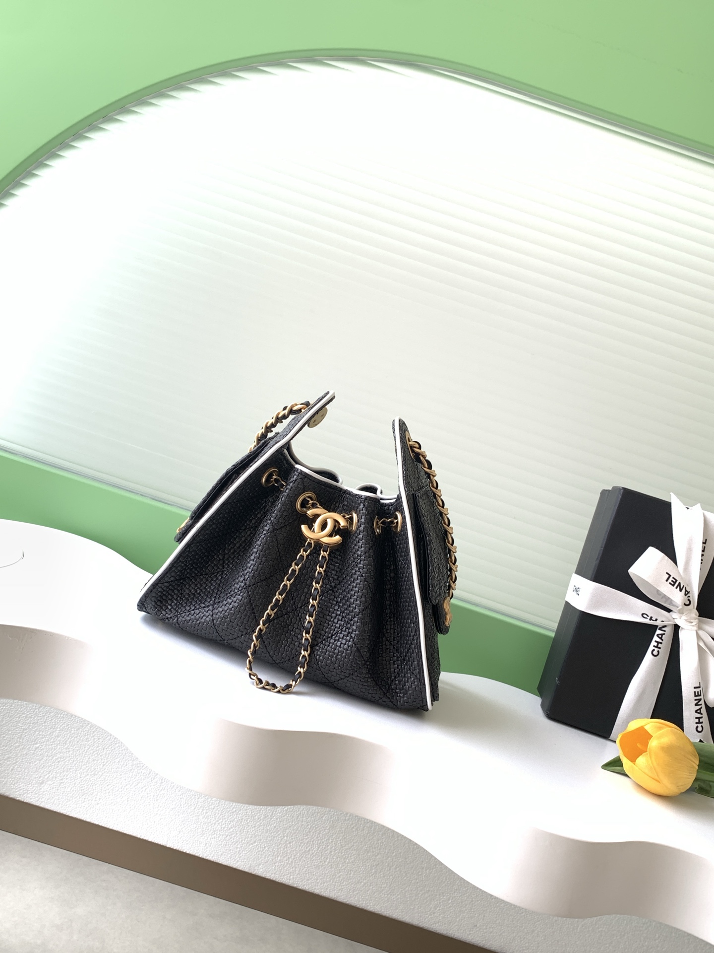 Chanel 25 Mini Handbag in Black and white Braided Raffia