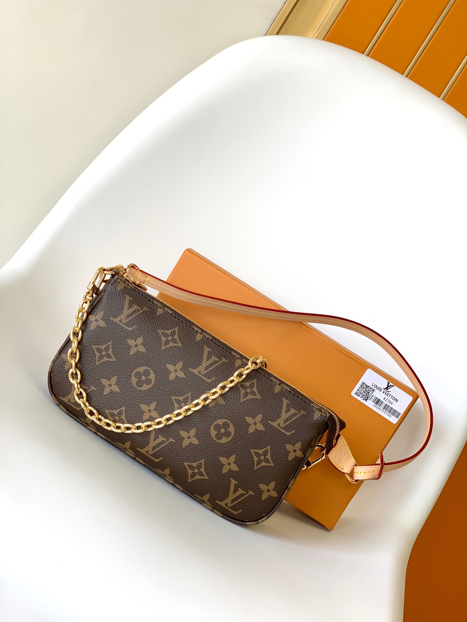 M82766 LV Pochette Accessoires in monogram canvas