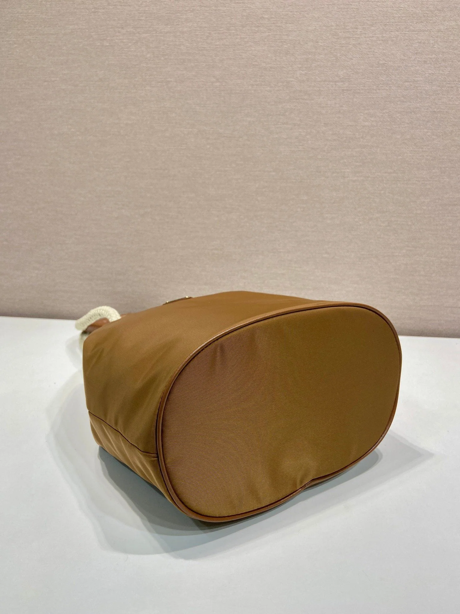 Prada BUCKET BAG 28 IN SEPIA BROWN RE-NYLON GOLD LOGO