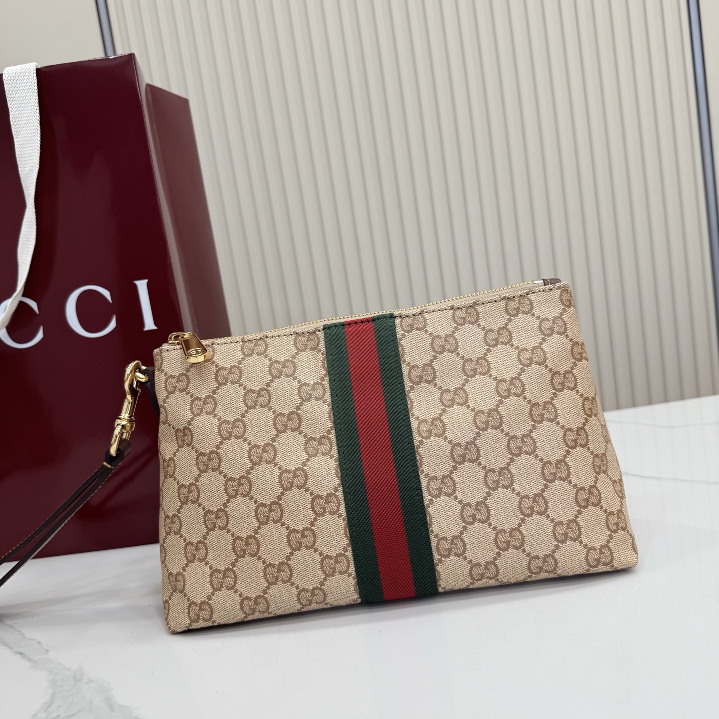 Gucci Small GG pouch with Web875821