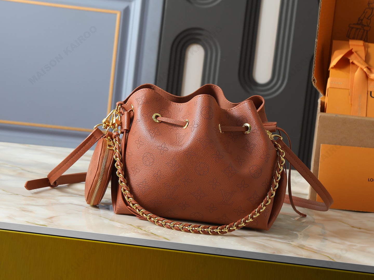 Louis Vuitton LV Mahina Bella Cognac Perforated Monogram Leather Drawstring Bucket Shoulder Bag - KAIROO