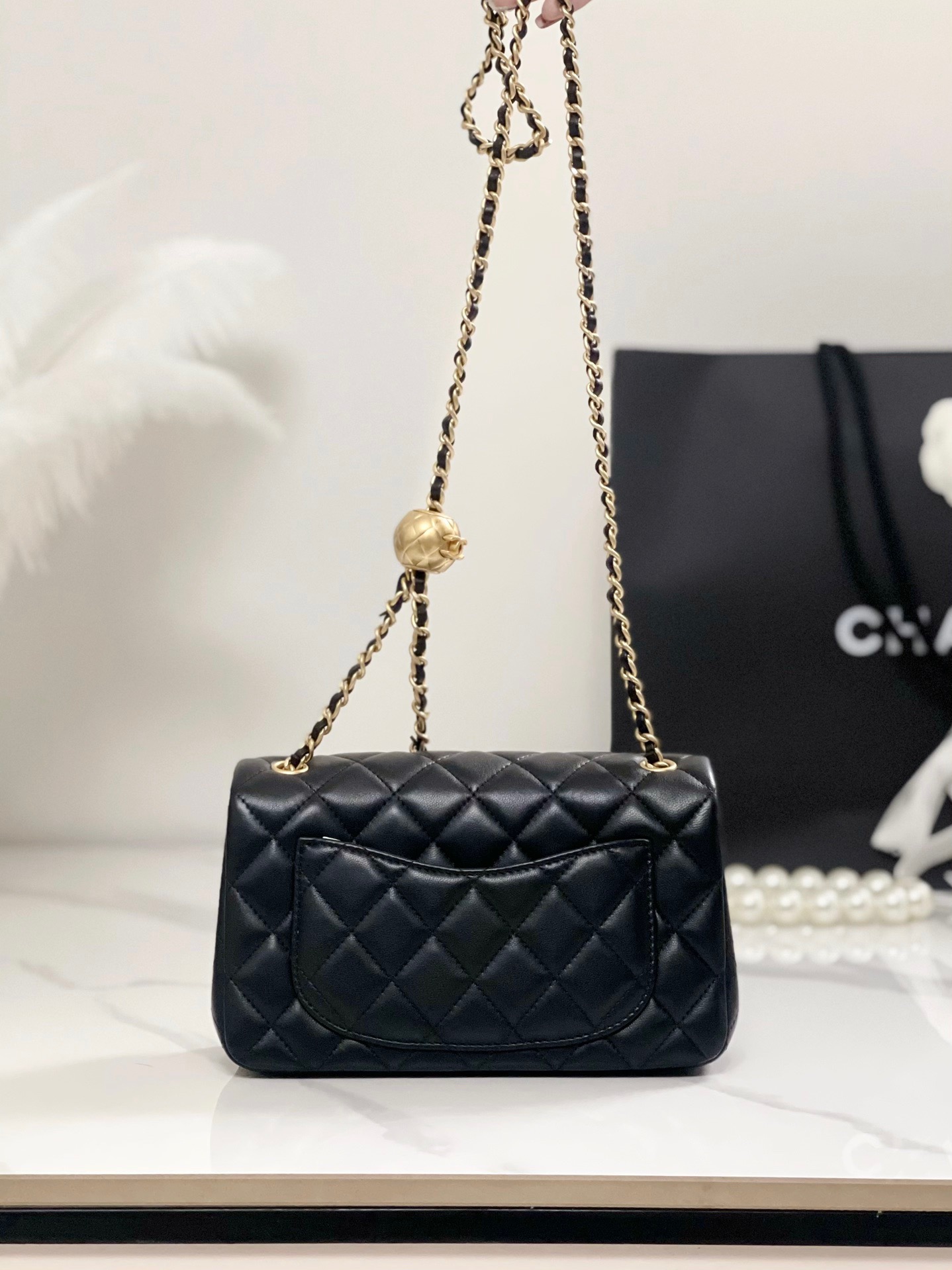 Chanel lambskin small gold ball crossbody bag
