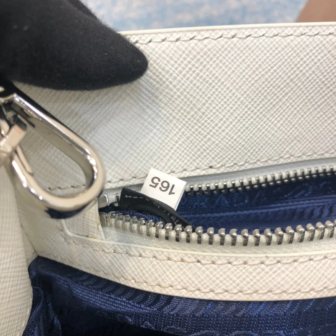 Prada MINI 23 BAG IN WHITE SAFFIANO LEATHER
