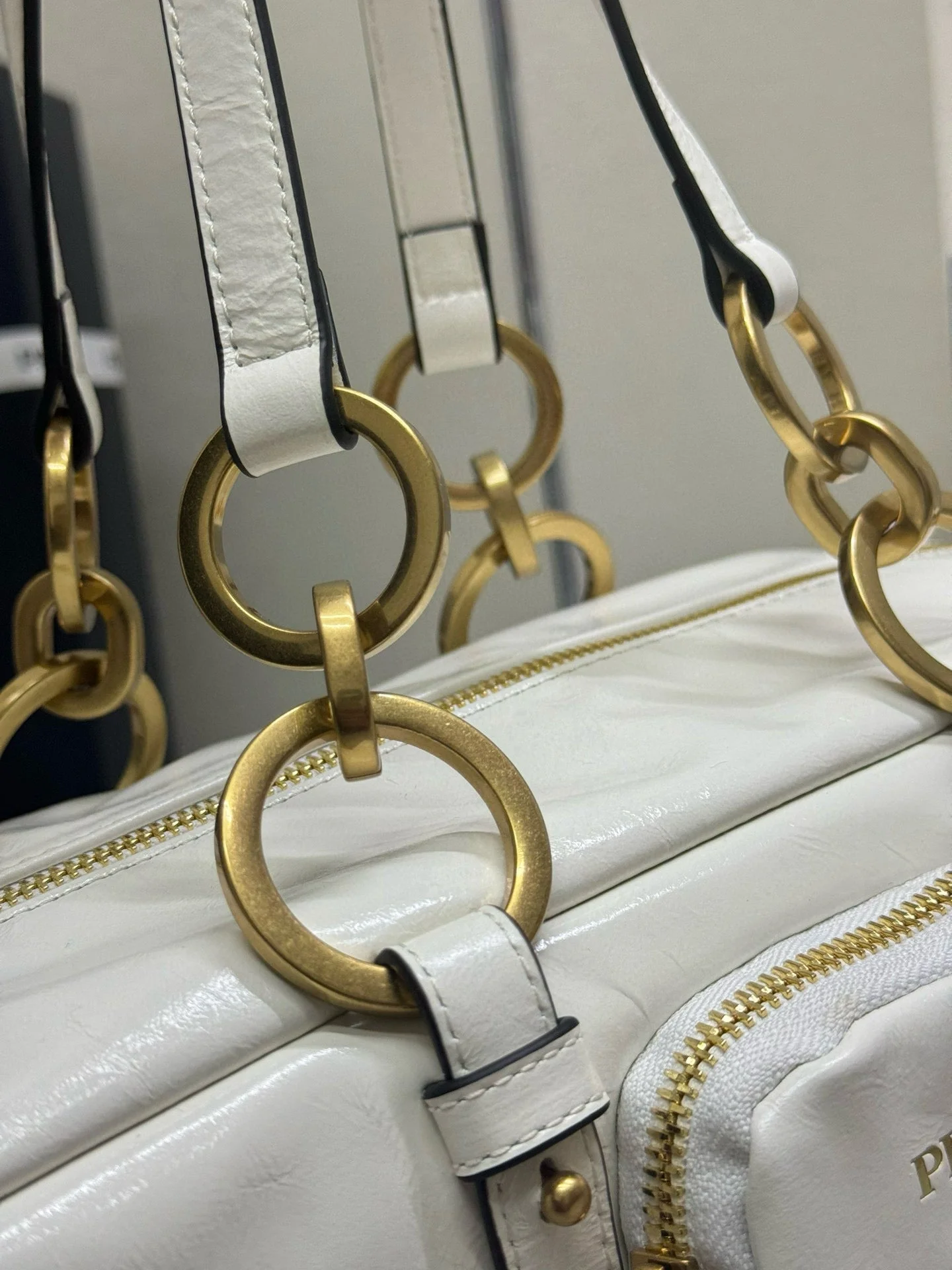 Prada DANGLE TOP HANDLE BAG 30 IN WHITE PATENT CALFSKIN