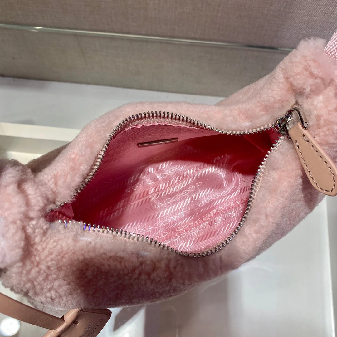 Prada HOBO BAG 23 IN LIGHT PINK SHEARLING
