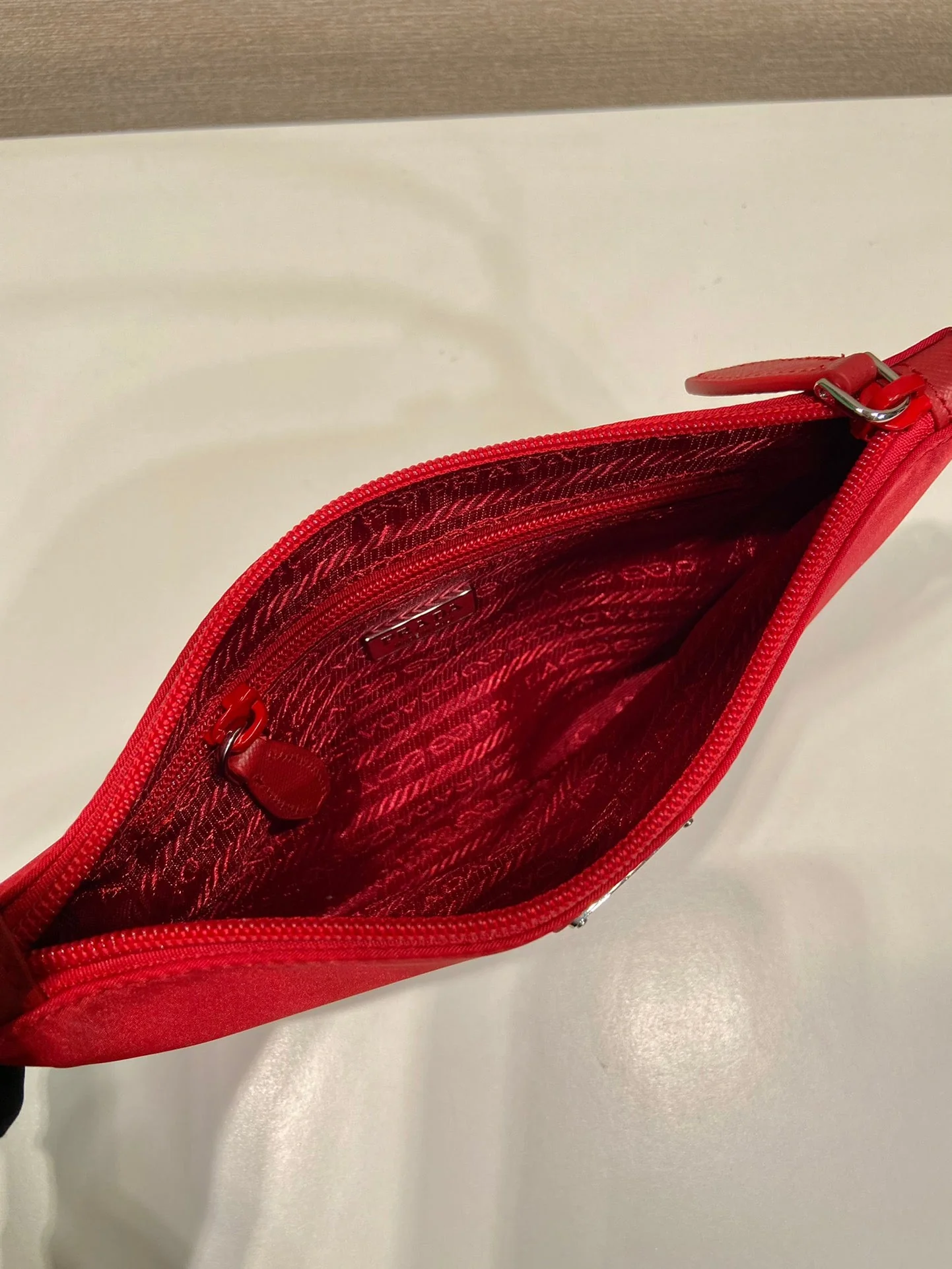Prada SHOULDER BAG 24 WITH TRIANGLE LOGO IN PASSION RED RE-NYLON FABRIC