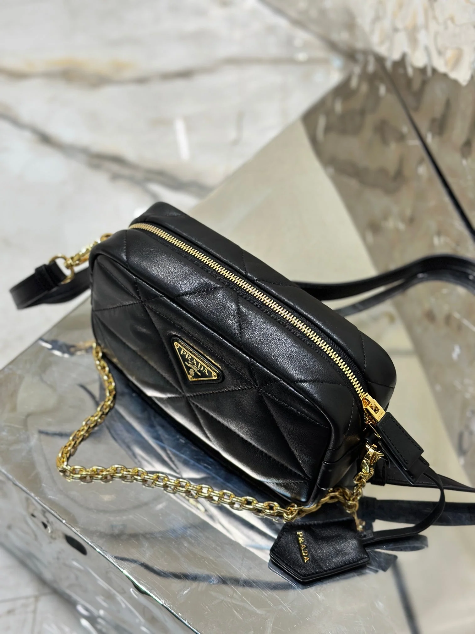Prada CAMERA BAG 22 IN BLACK TRIANGLE PATTERN QUILTED LAMBSKIN GOLD HARDWARE
