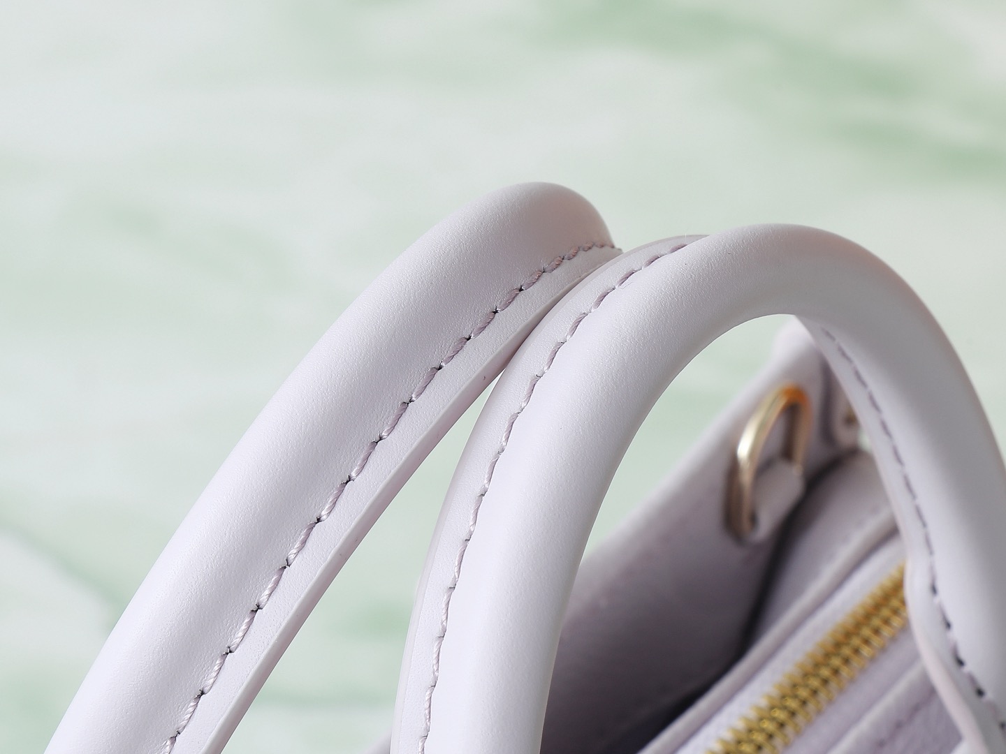 Louis Vuitton LV TM ONTHEGO EAST WEST CHAIN ​​White