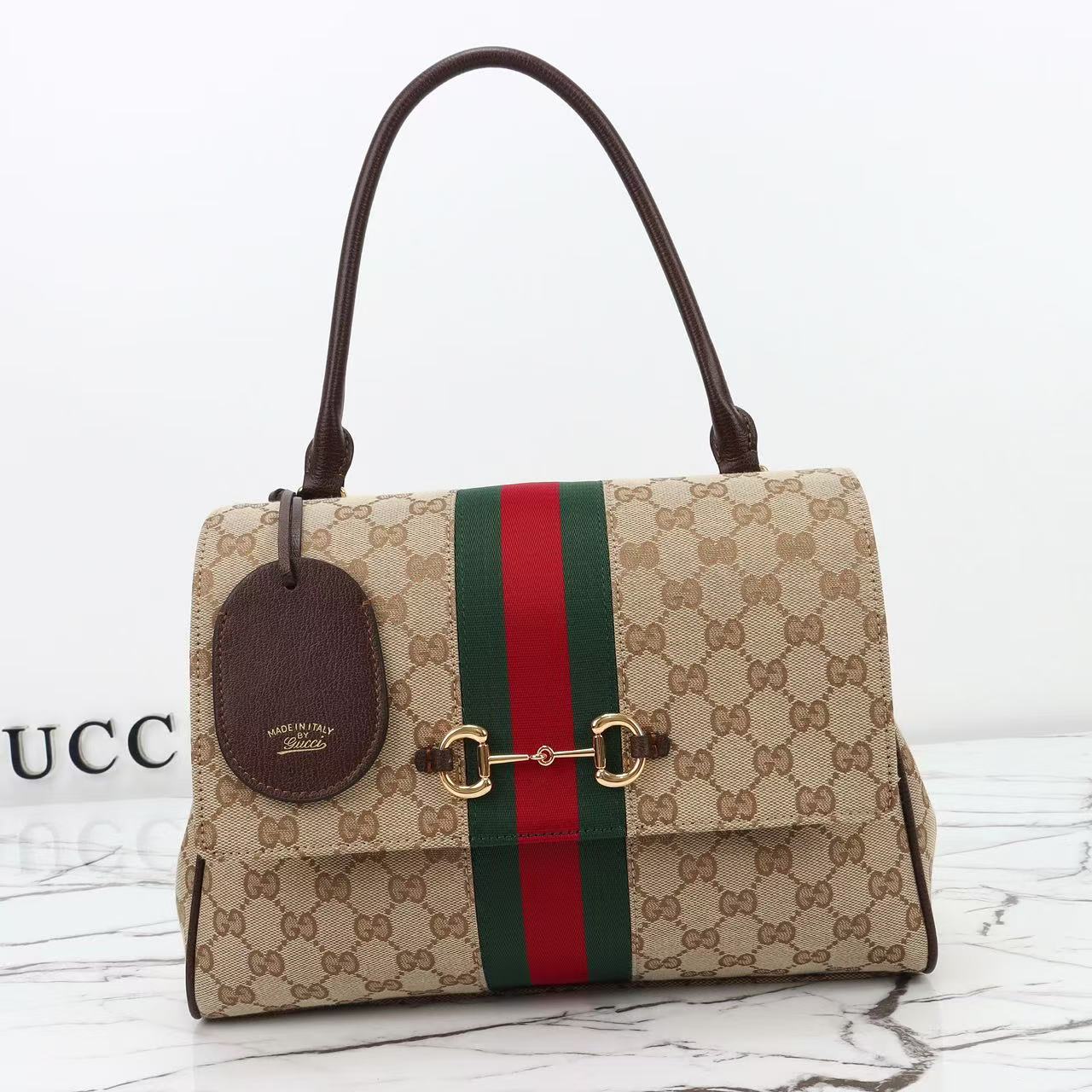 GUCCI Paparazzo medium top handle bag